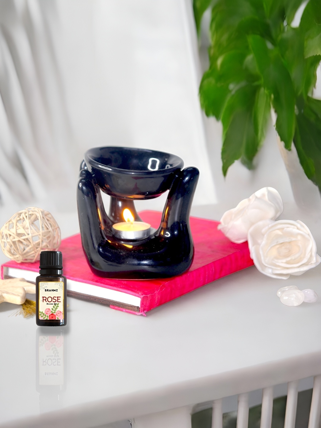 

Brahmz Black Hand Shaped Ceramic Candle Aroma Oil Diffusers with 2 Tealights and Rose Oil