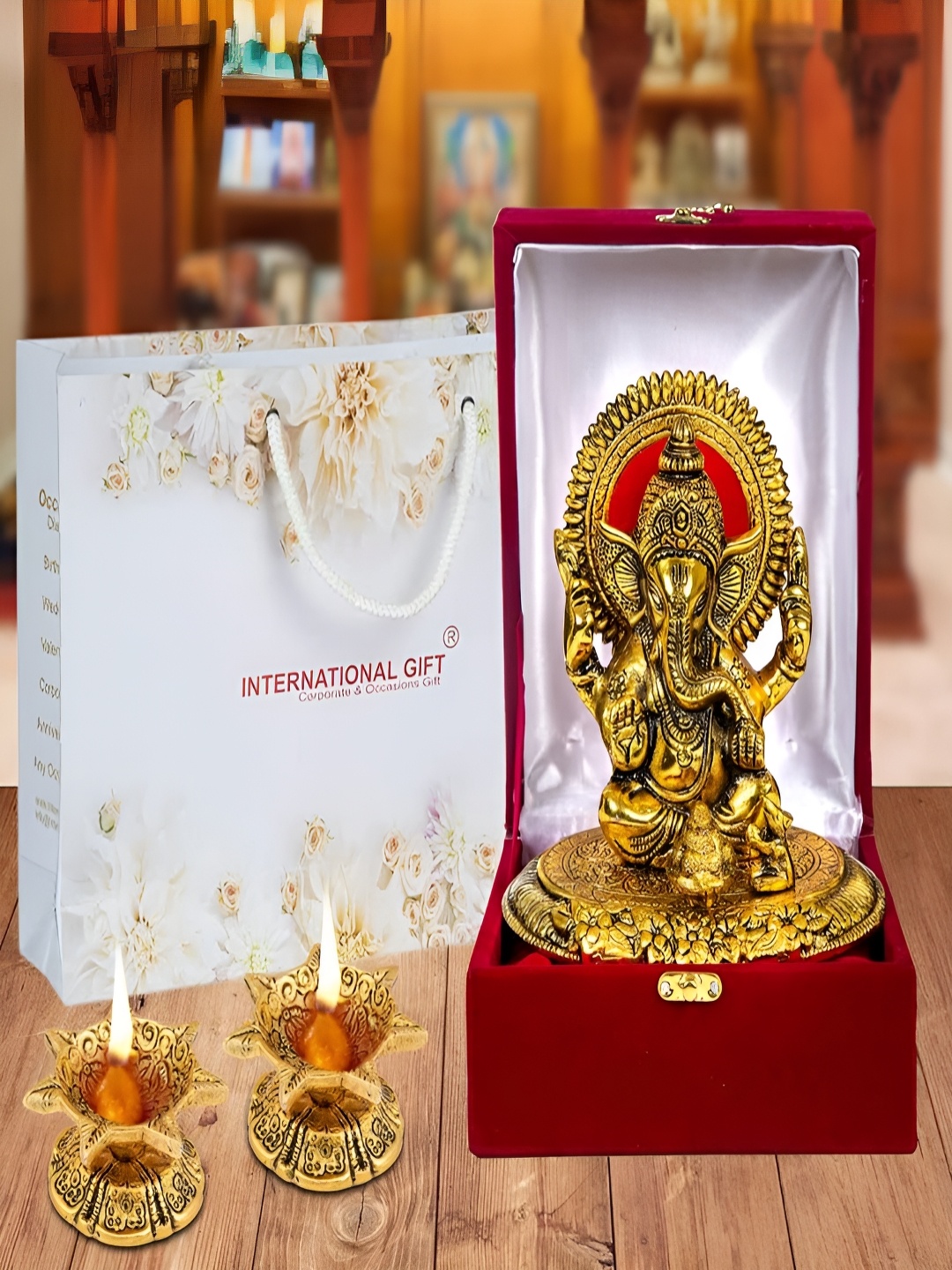 

INTERNATIONAL GIFT Gold-Toned 4 Pieces Religious Idol Showpiece With Diyas & Box