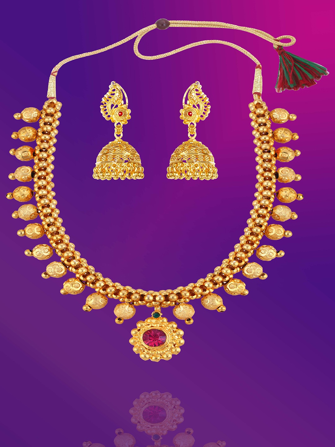 

Lila Gold Plated Stone Studded & Beadded Antique Jewellery Set