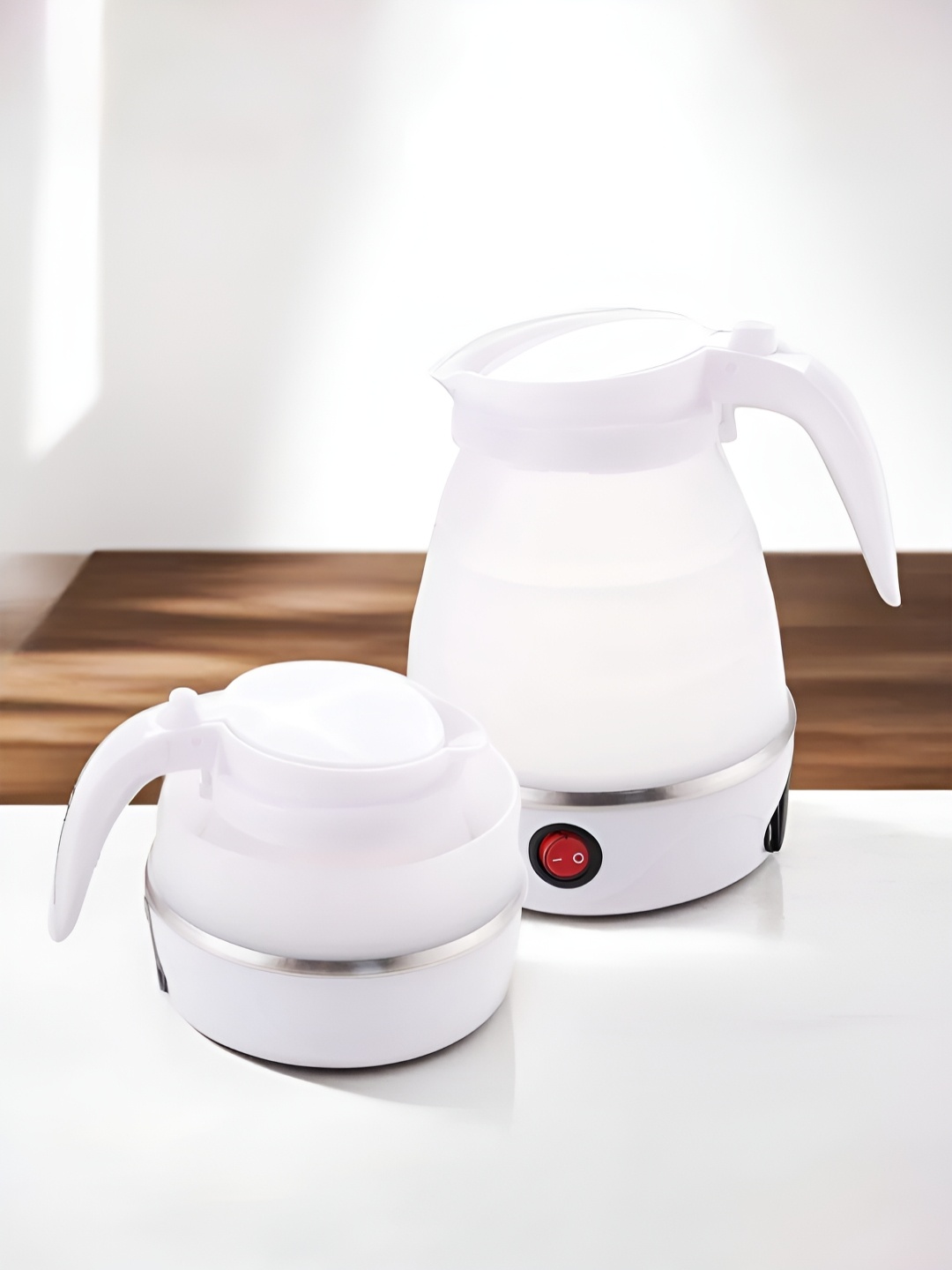 

The Better Home White & Grey Stainless Steel Portable Foldable 600W Electric Kettle 600 ml