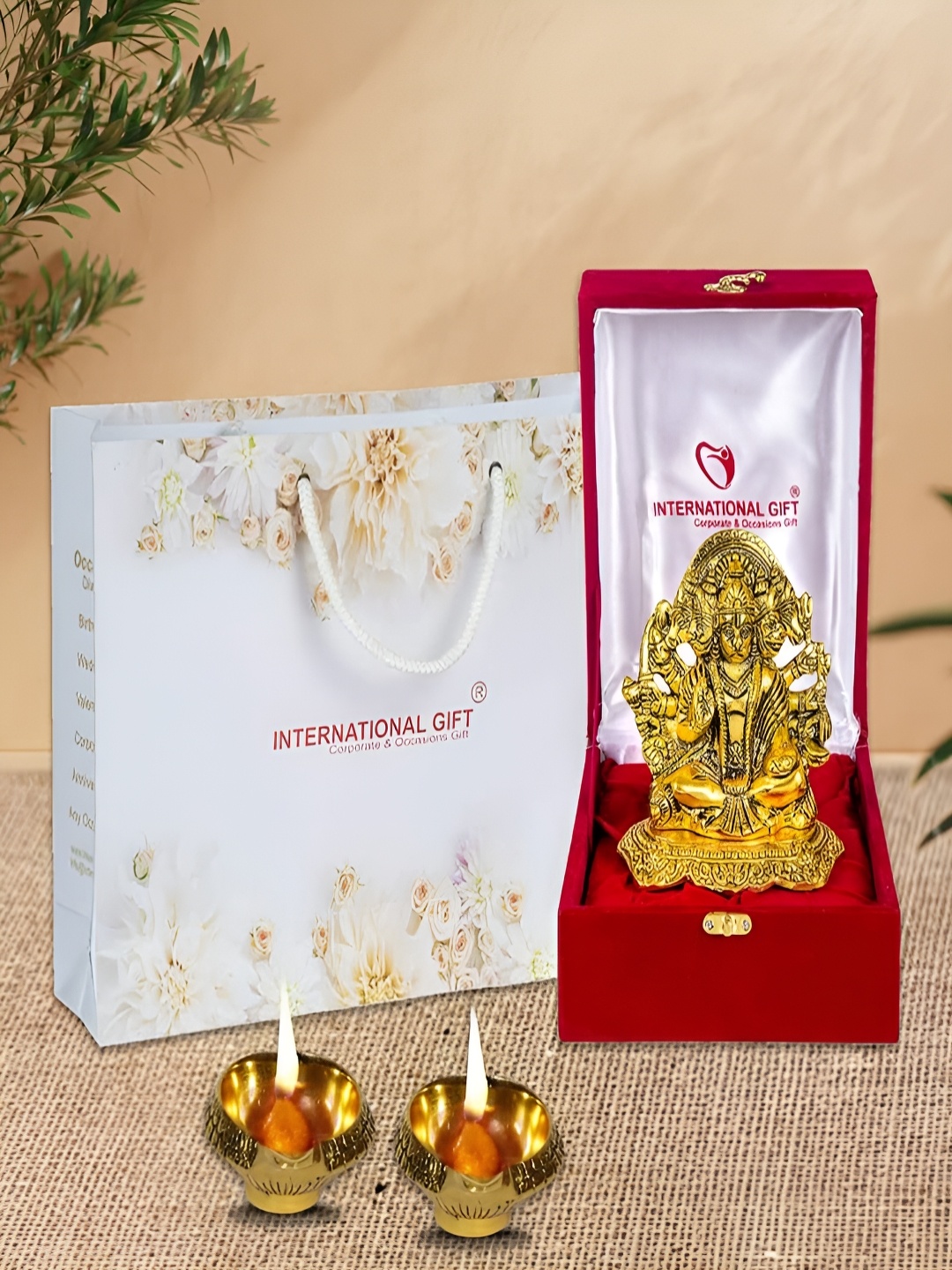 

INTERNATIONAL GIFT Gold-Toned 4 Pieces Religious Idol Showpiece With Diyas & Box