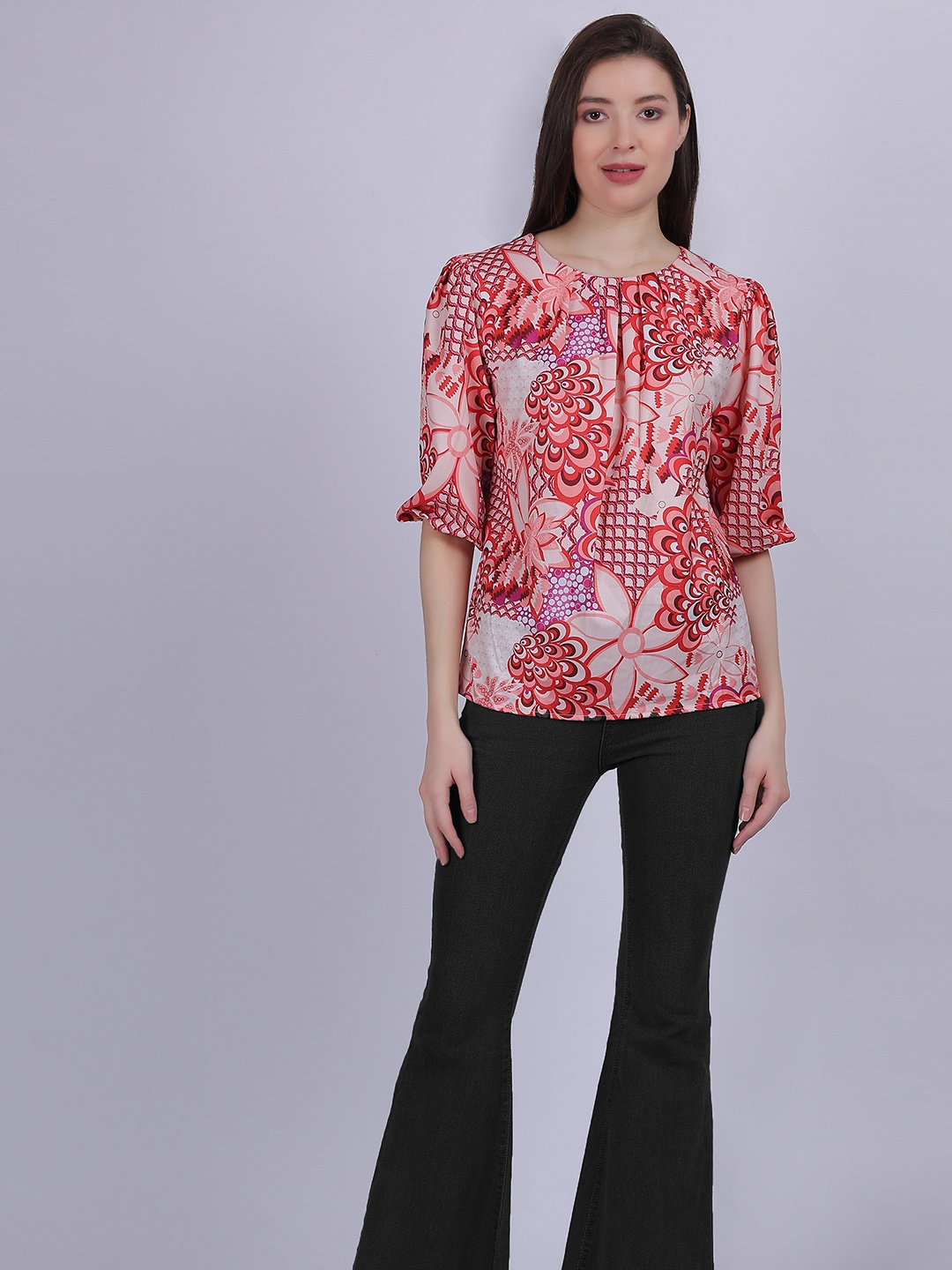 

Aumbe Women Abstract Printed Round Neck Top, Peach