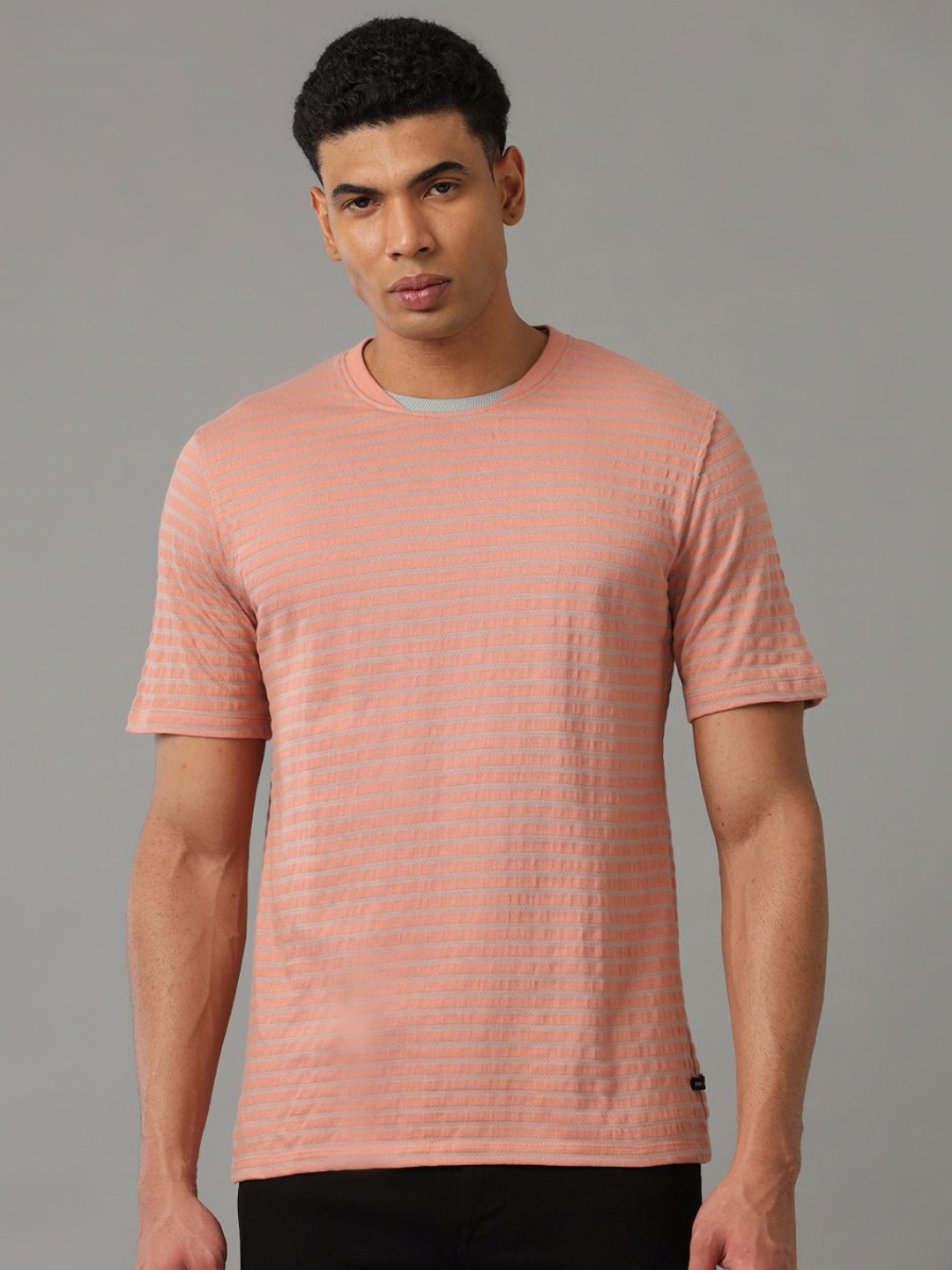 

Voi Jeans Men Solid Round Neck Cotton T-shirt, Peach