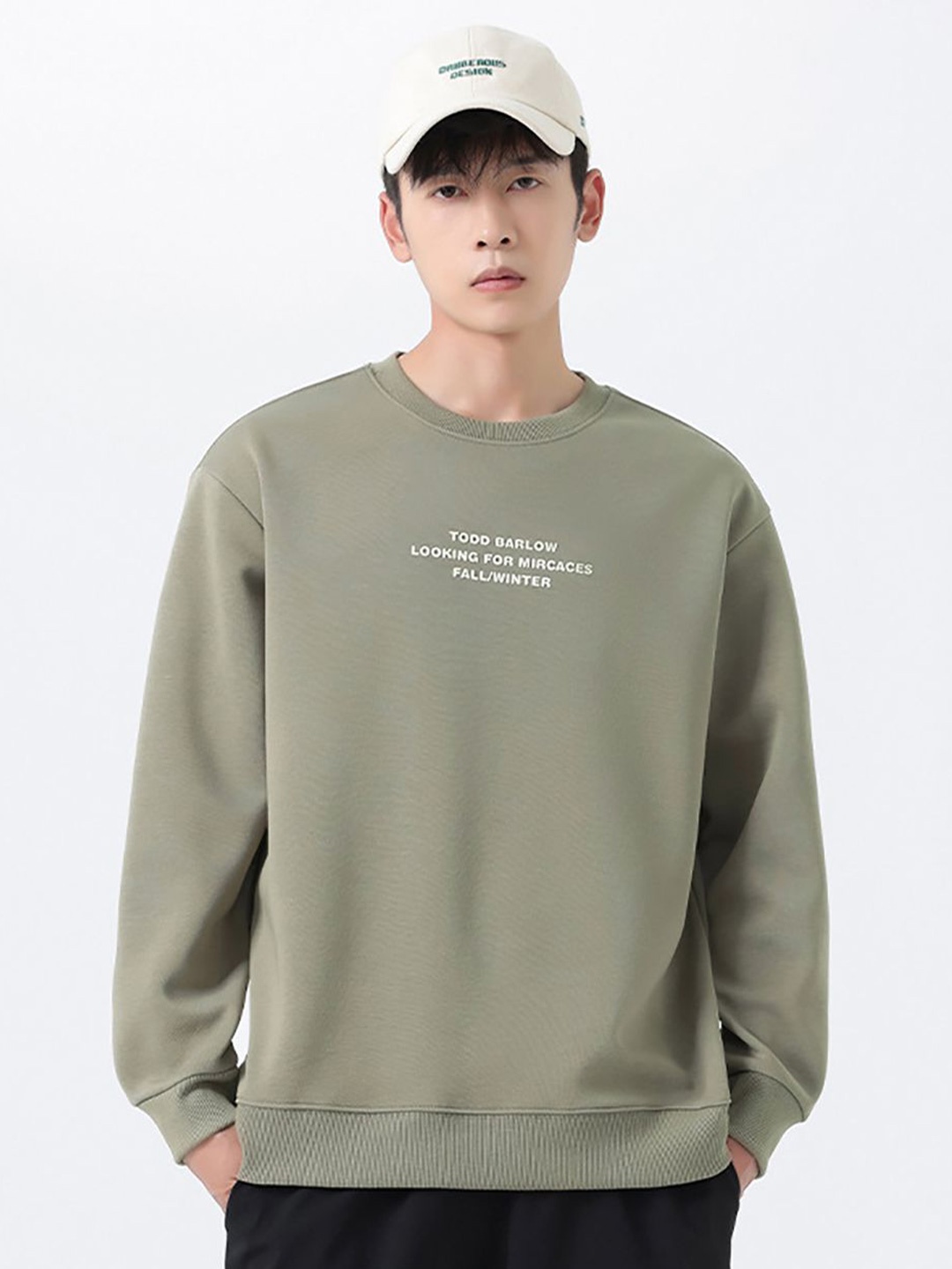 

StyleCast x Revolte Men Typography Printed Cotton Sweatshirt, Green