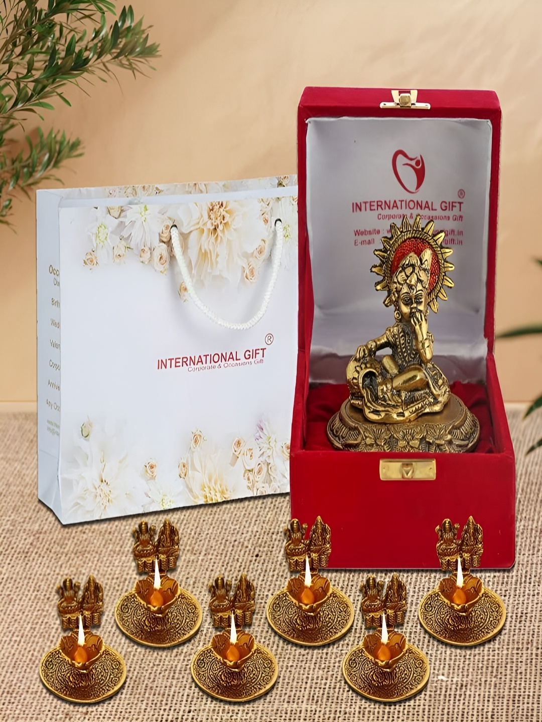 

INTERNATIONAL GIFT Gold-Toned Laddu Gopal Idol showpiece with Diya