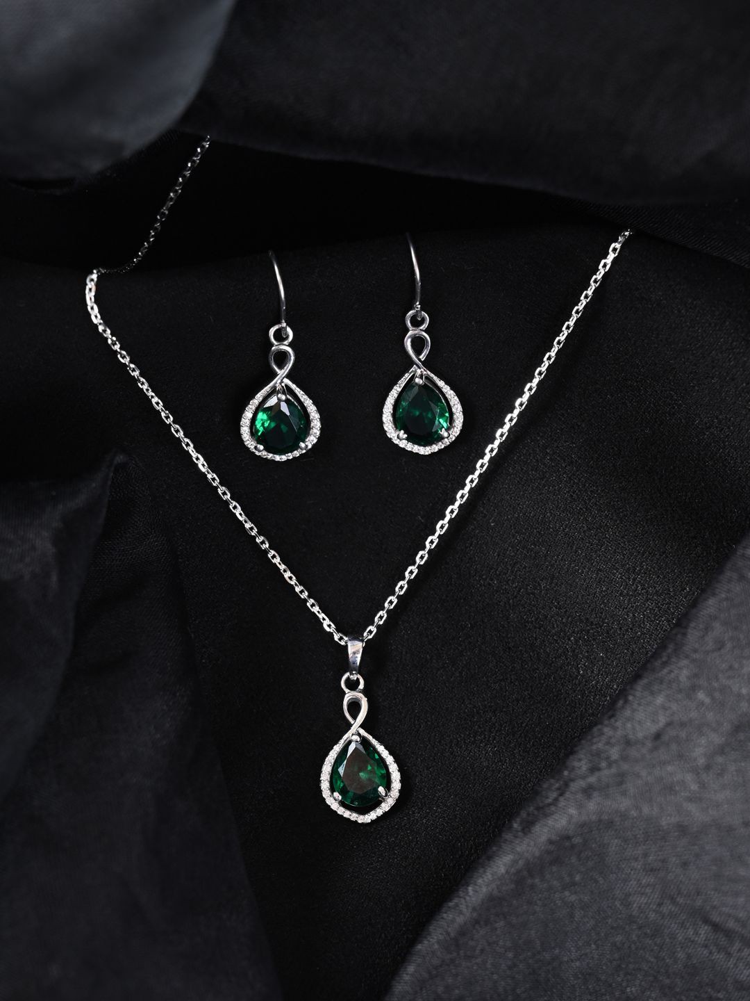 

Clara 925 Sterling Silver Rhodium Plated CZ Studded Pendant & Earrings