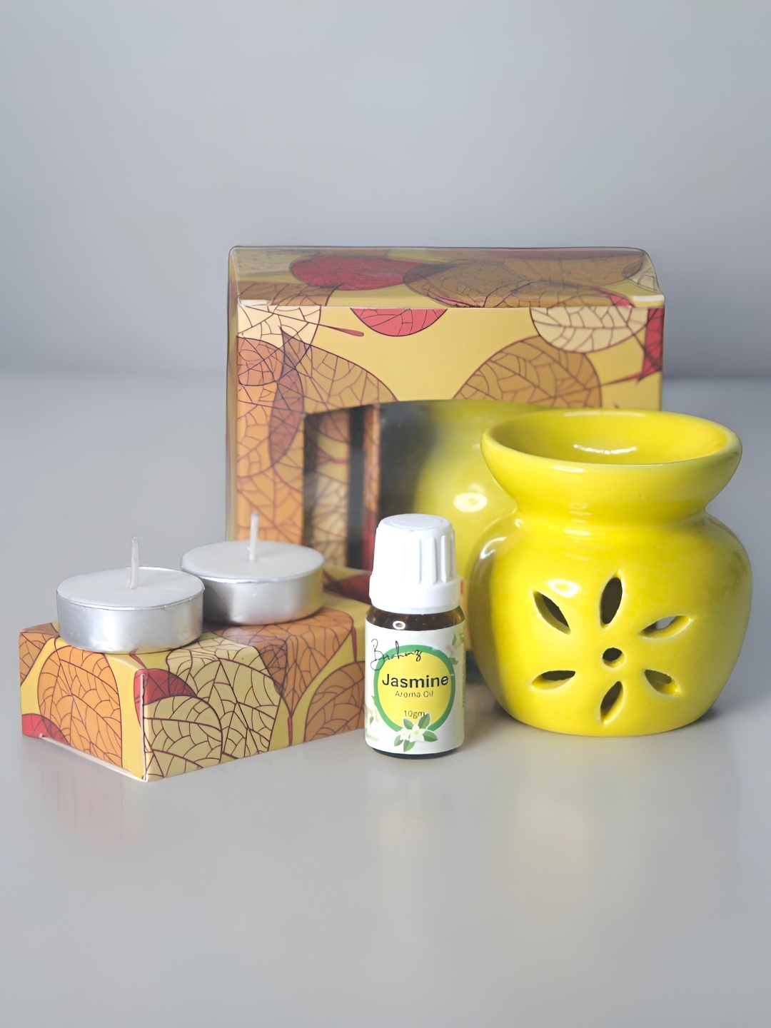 

Brahmz Yellow 5 Pieces Candle With Tealights And Jasmine Oil Ceramic Aroma Diffusers