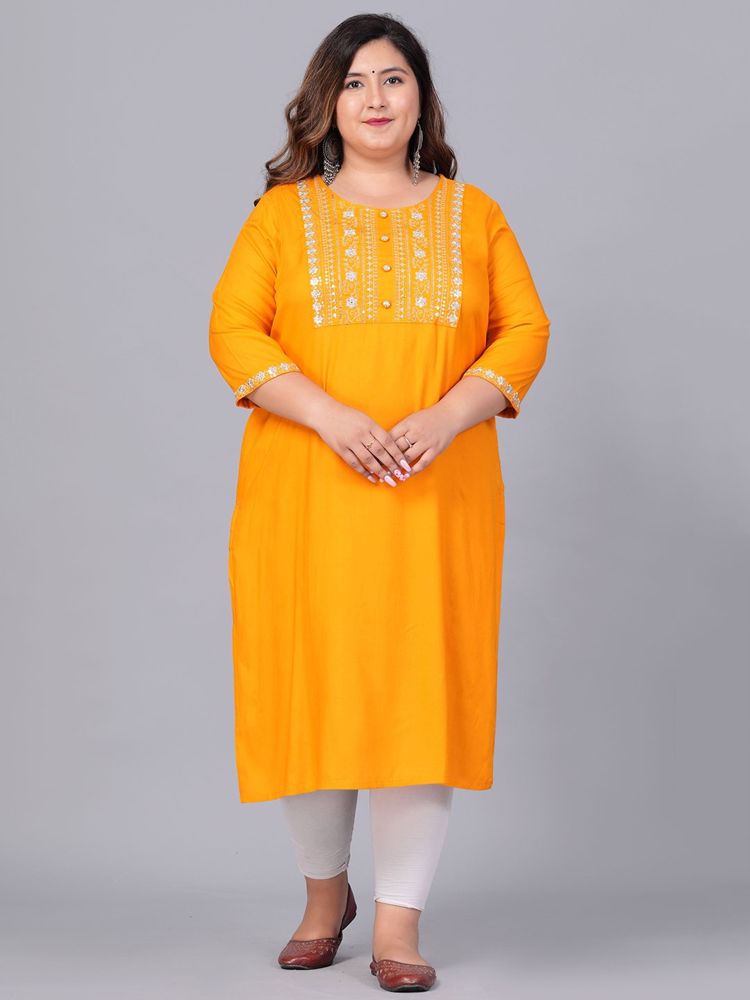 

Sztori Women Yoke Design Mirror Work Kurta, Yellow