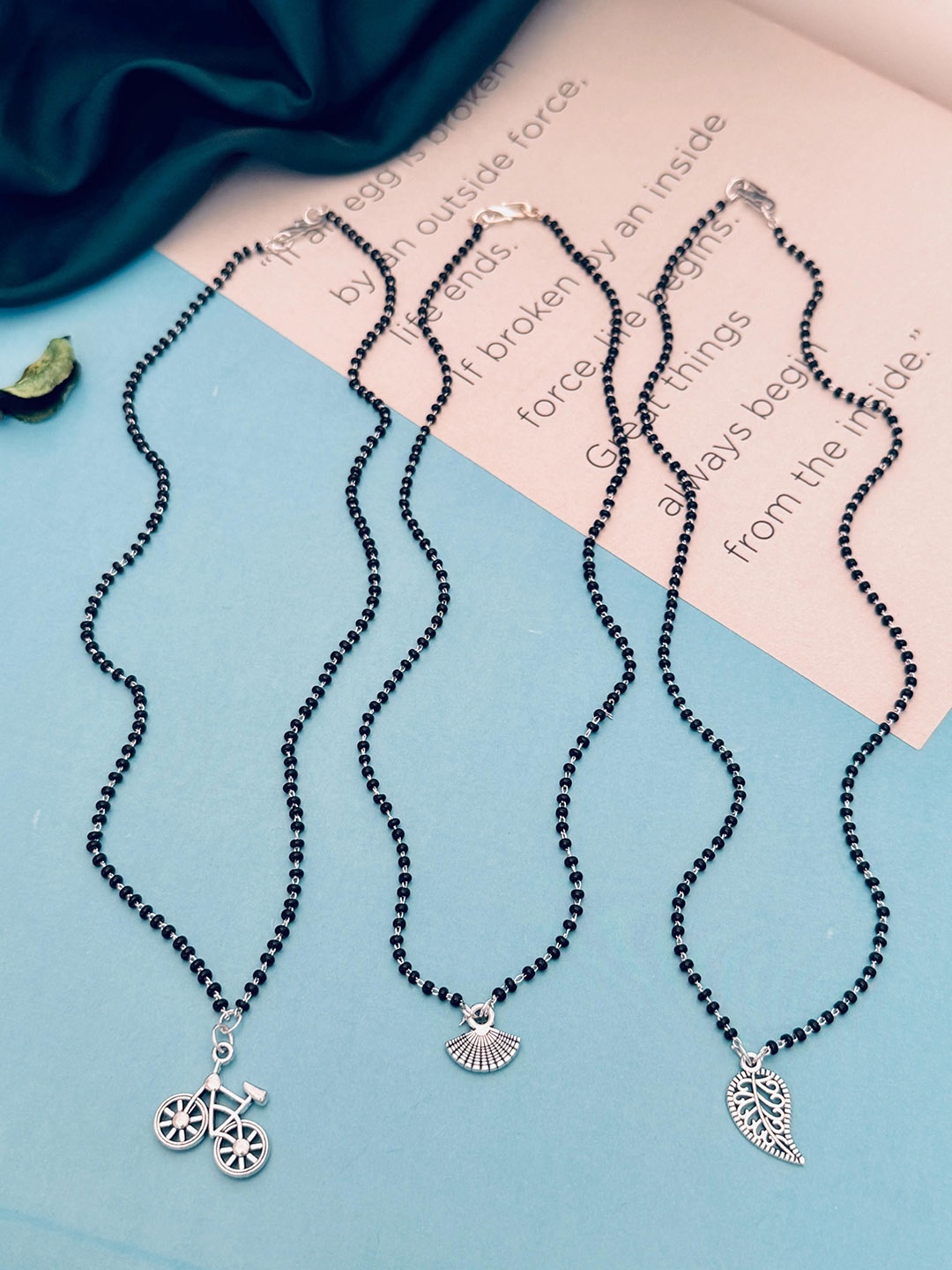 

Anouk Silver-Plated Artificial Stones and Beads Mangalsutra