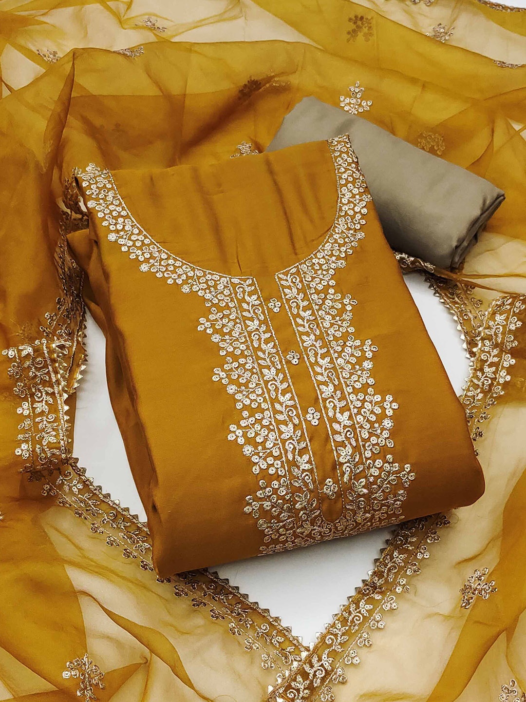 

KALINI Floral Embroidered Sequinned Pure Cotton Semi-Stitched Dress Material, Mustard