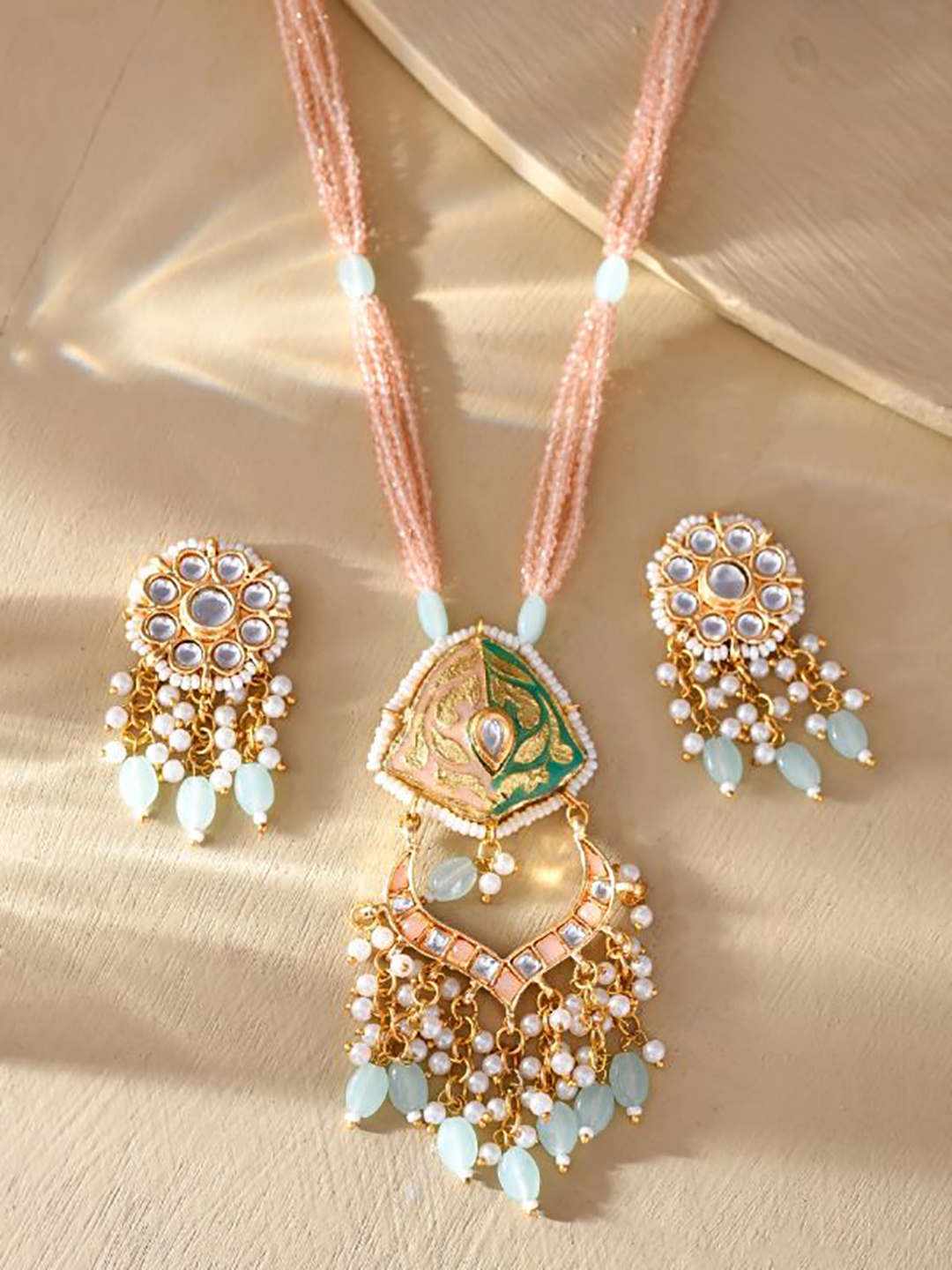

DASTOOR Gold Plated Stone Studded & Beaded Jewellery Set