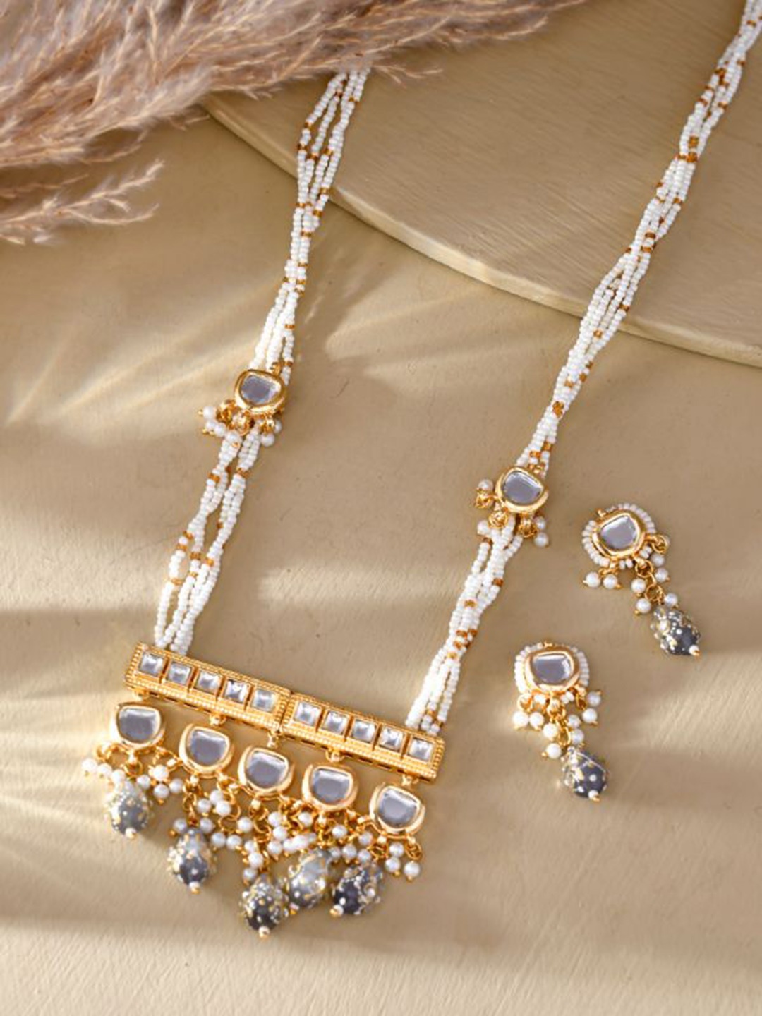 

DASTOOR Gold Plated Stone Studded & Beaded Jewellery Set