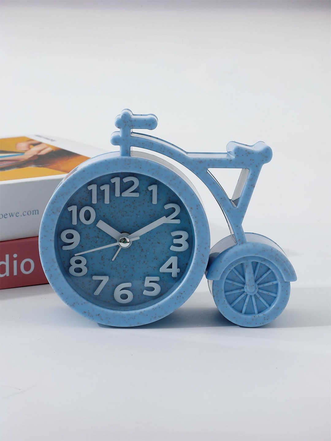 

Kuber Industries Blue & White Cycle Shaped Contemporary Table Clock