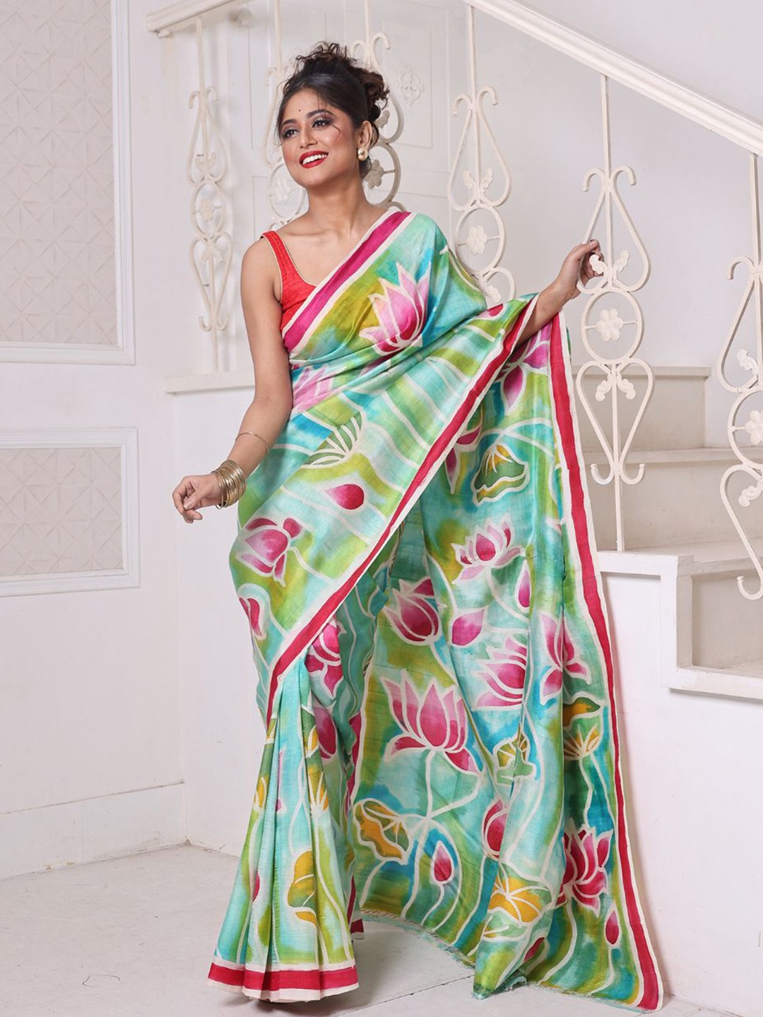 

Charukriti Floral Pure Silk Saree and Blouse Piece, Sea green