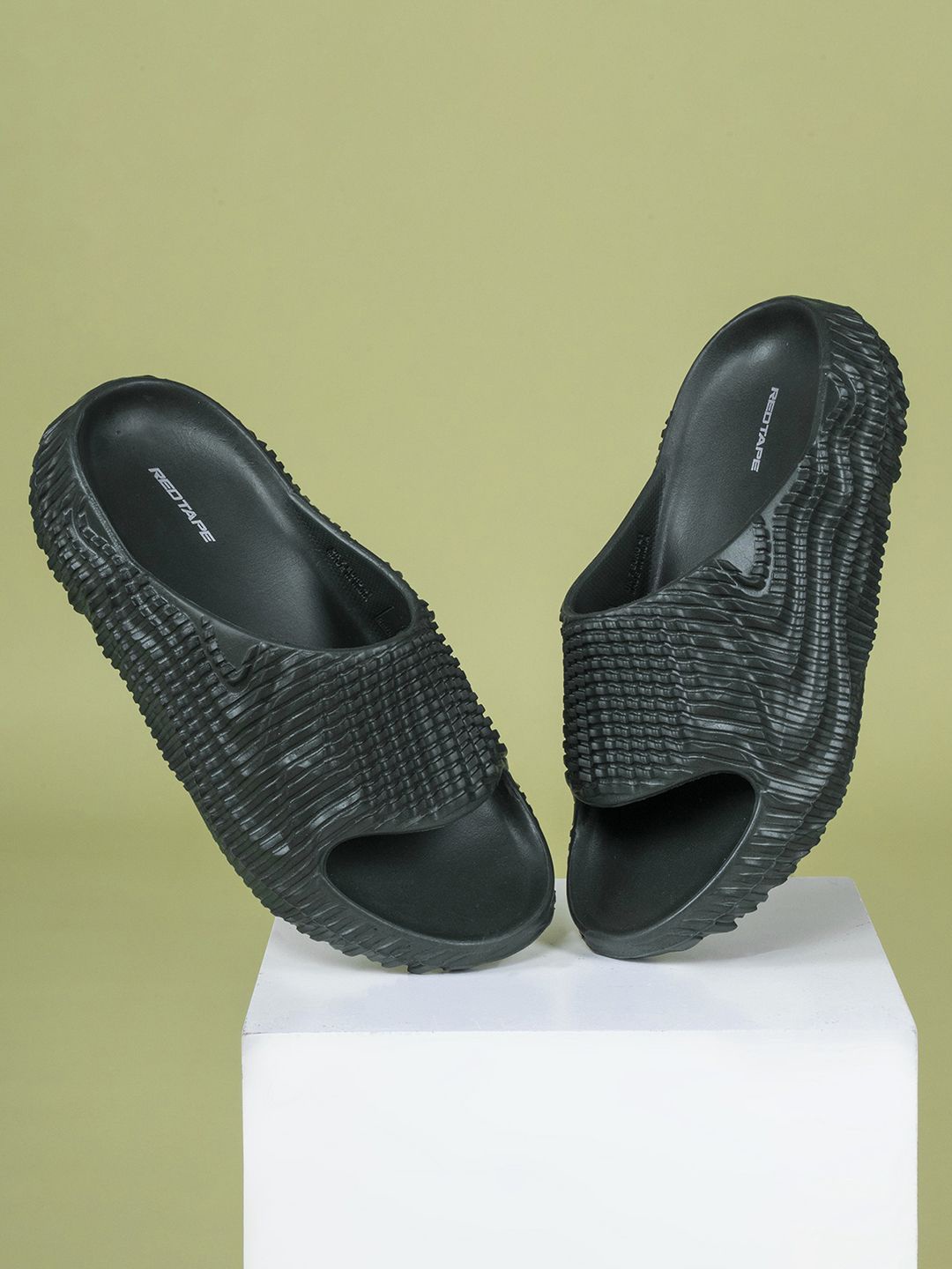 

Red Tape Men Self Design Casual Rubber Sliders, Green