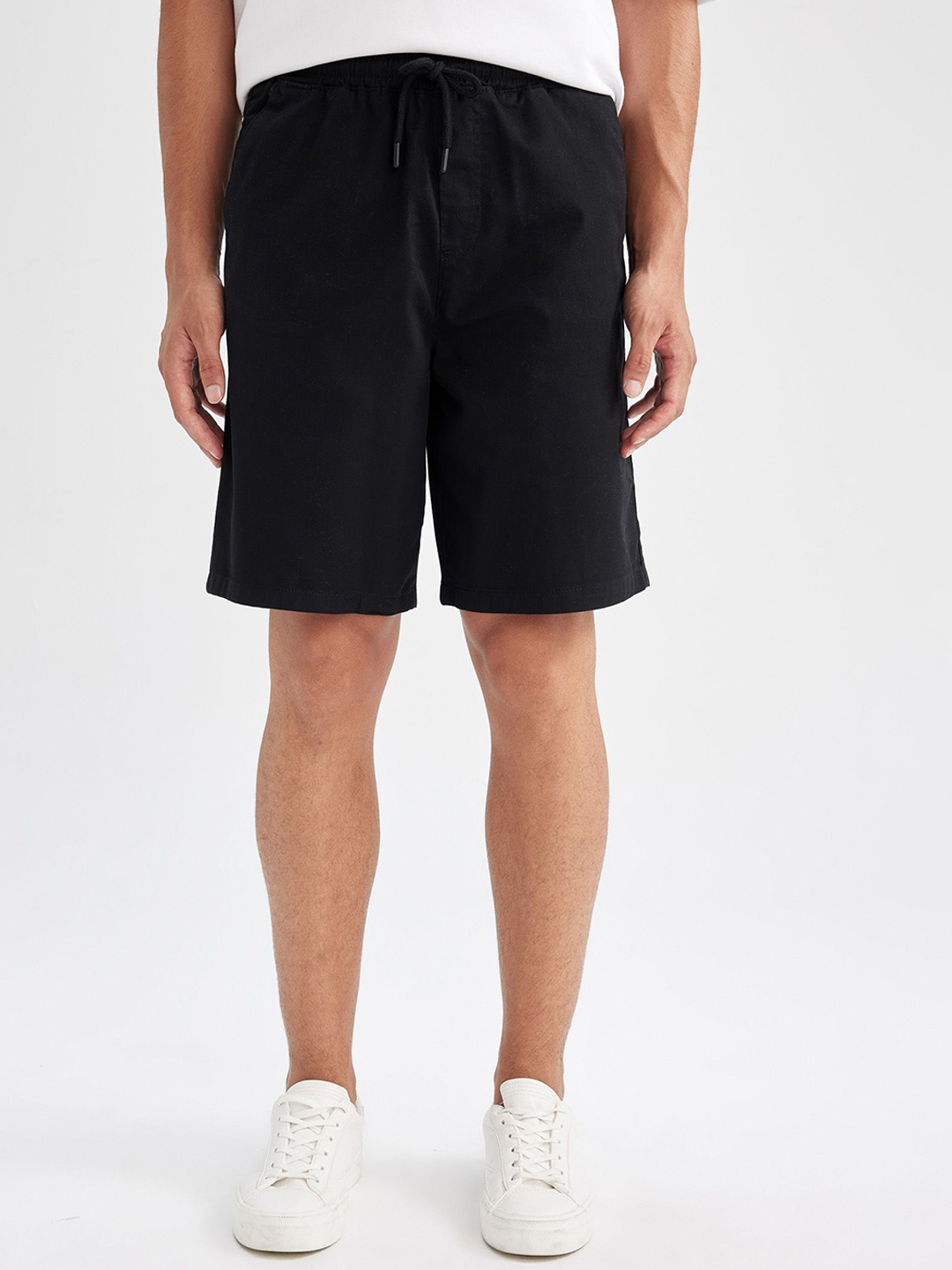 

DeFacto Men Solid Mid-Rise Regular Fit Shorts, Black