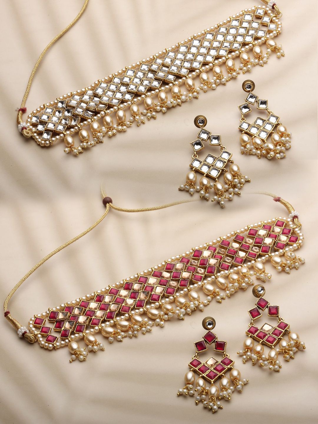 

Anouk Set of 2 Maroon Gold Plated Kundan Studded & Beaded Jewellery Set
