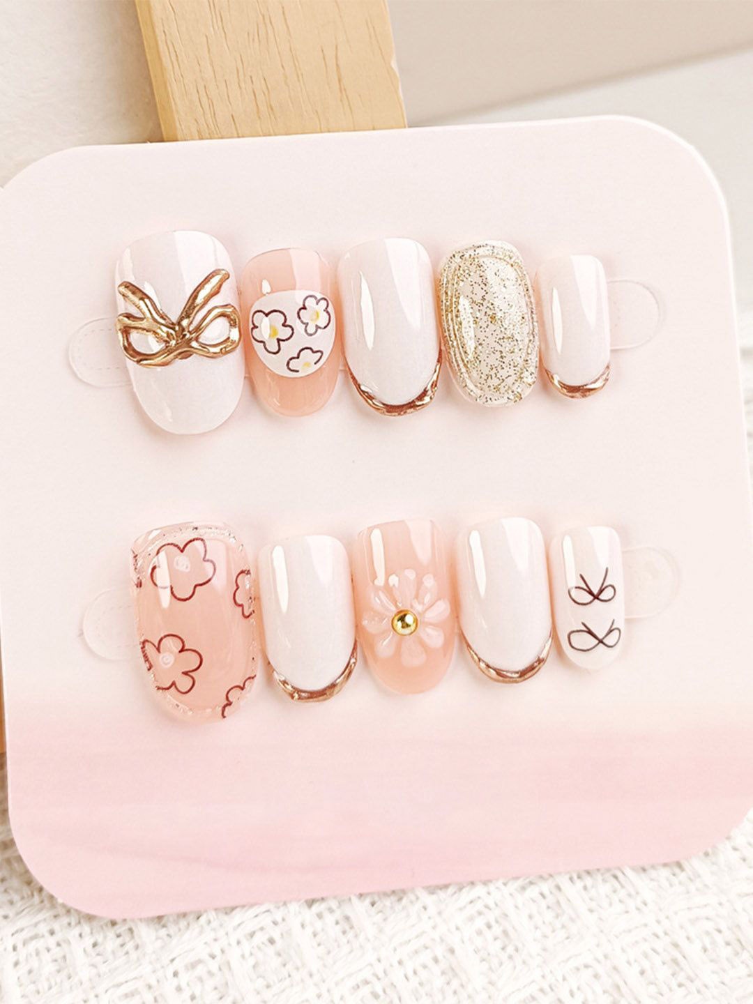 

Secret Lives Set Of 24 Glossy Artificial Nails-Bow Flower & Stud Art Work, Beige