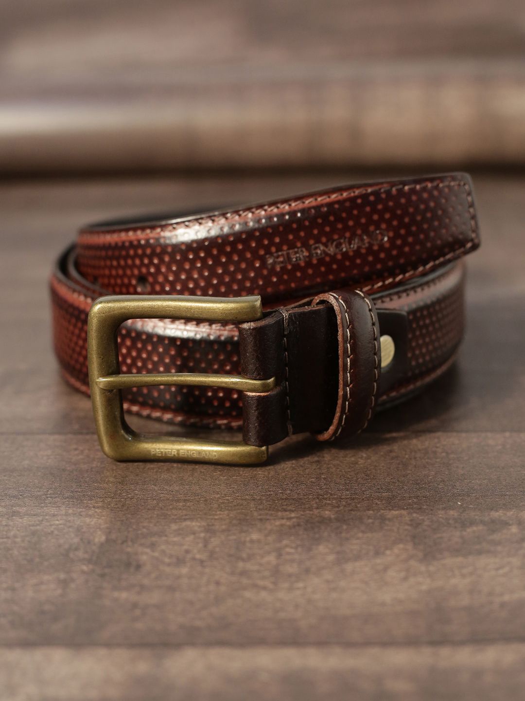 

Peter England Men Tang Closure Textured Leather Belt, Brown