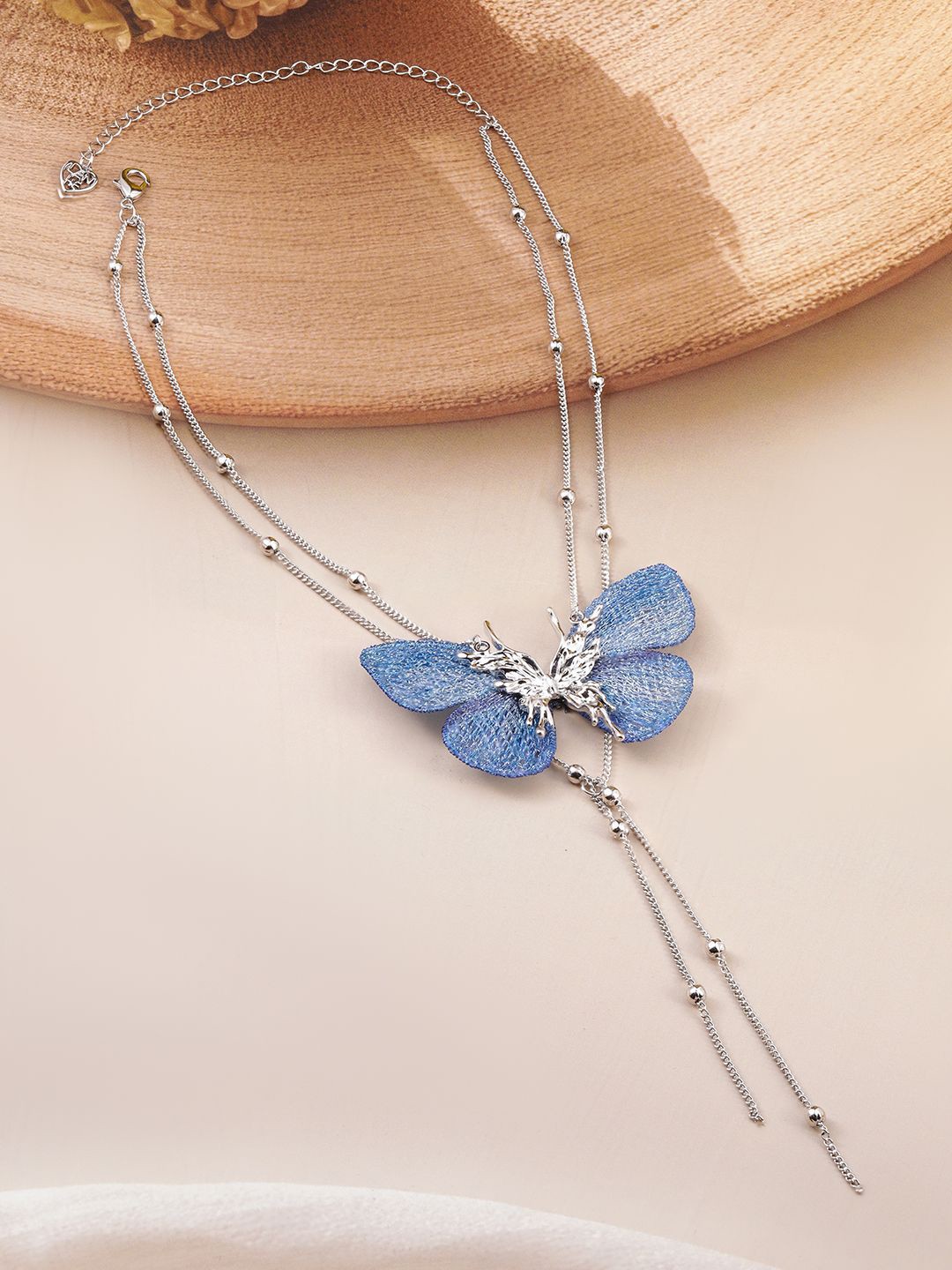 

Rubans Silver-Plated Butterfly Pendant Necklace with Blue Accents and Multi-Layered Chains