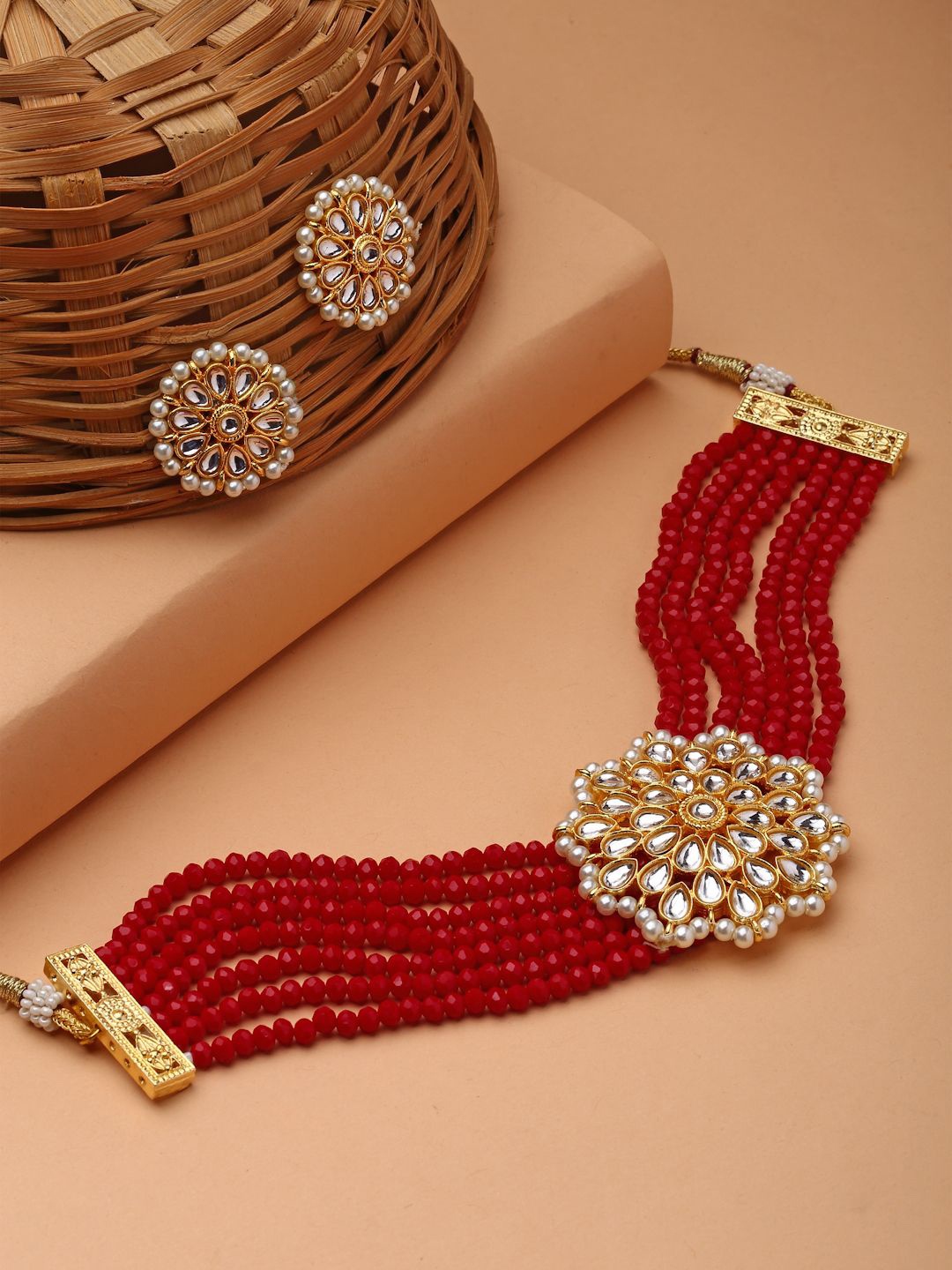 

Anouk Red Gold Plated Kundan Studded & Beaded Jewellery Set