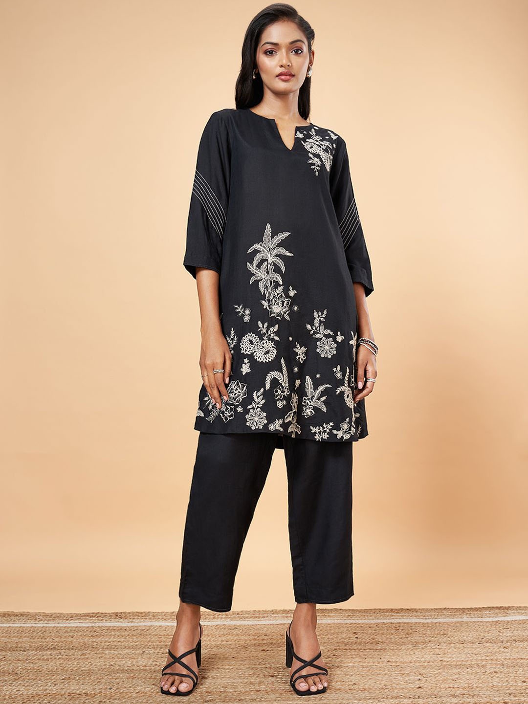 

Marigold Lane Women Embroidered Regular Kurti with Palazzos, Black