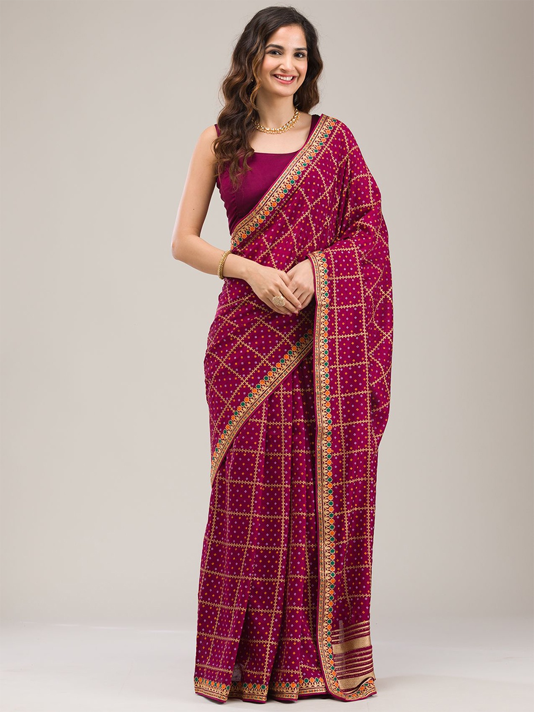 

Koskii Ethnic Motifs Embroidered Zari Saree, Purple