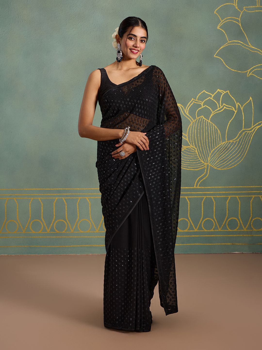 

Likha Embellished Embroidered Pure Georgette Saree, Black