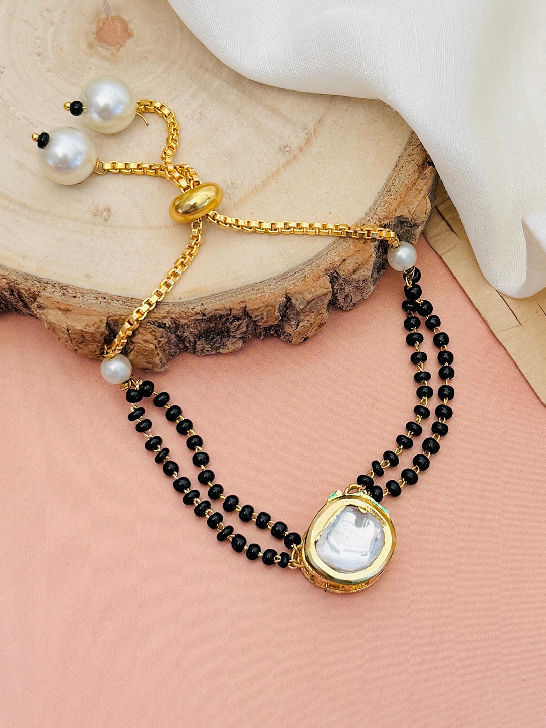 

ABDESIGNS Mesmerising Gold-Plated Stones Studded and Beaded Hand Mangalsutra