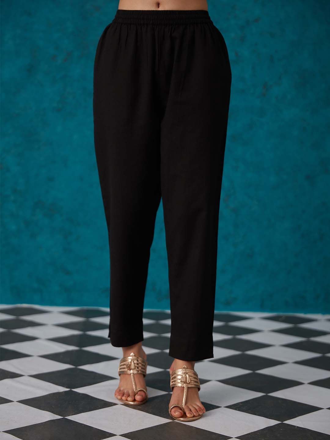 

Likha Women Solid Mid Rise Trousers, Black