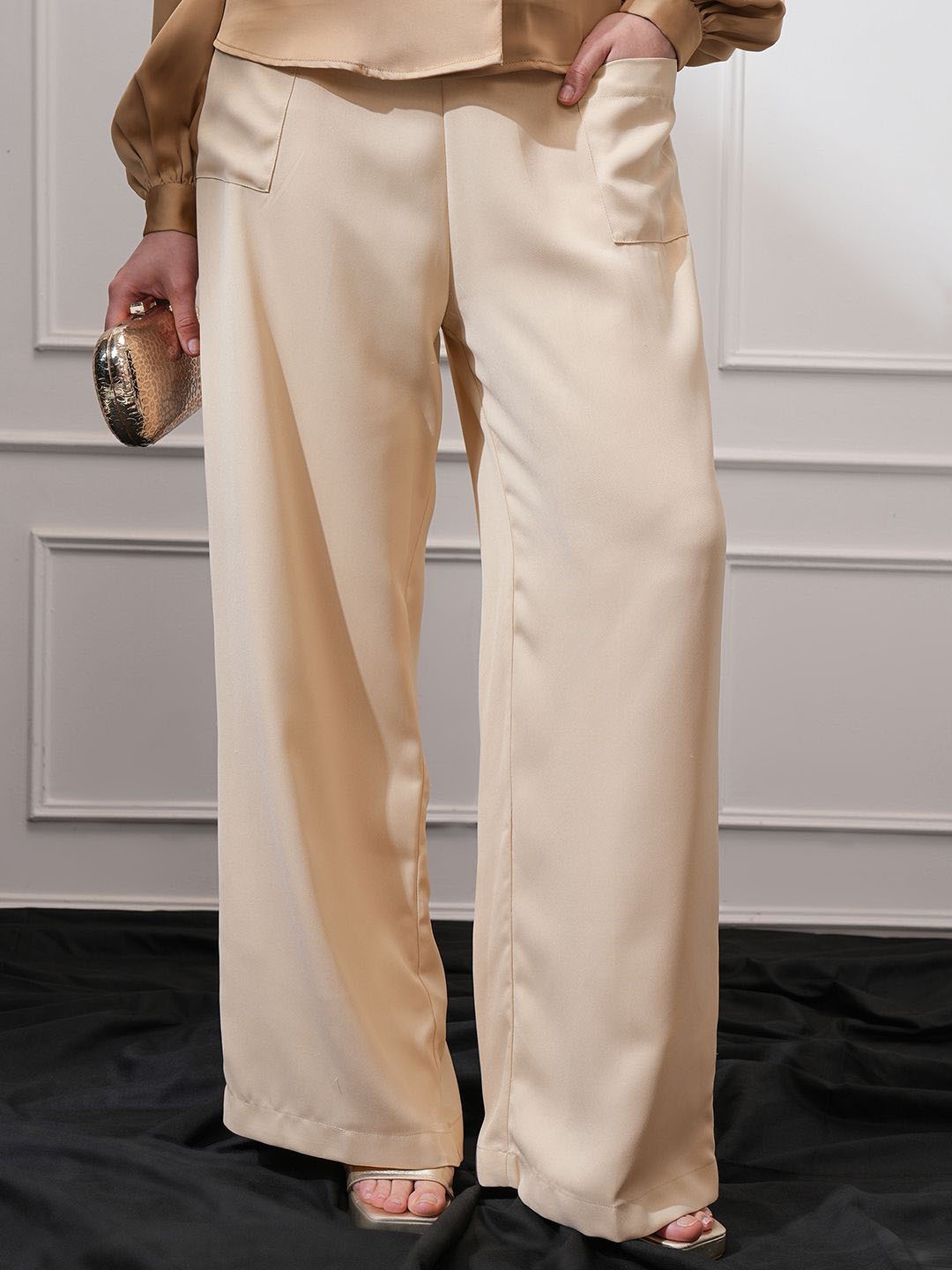 

CHIC BY TOKYO TALKIES Women Mid-Rise Flared Wide Leg Trousers, Beige