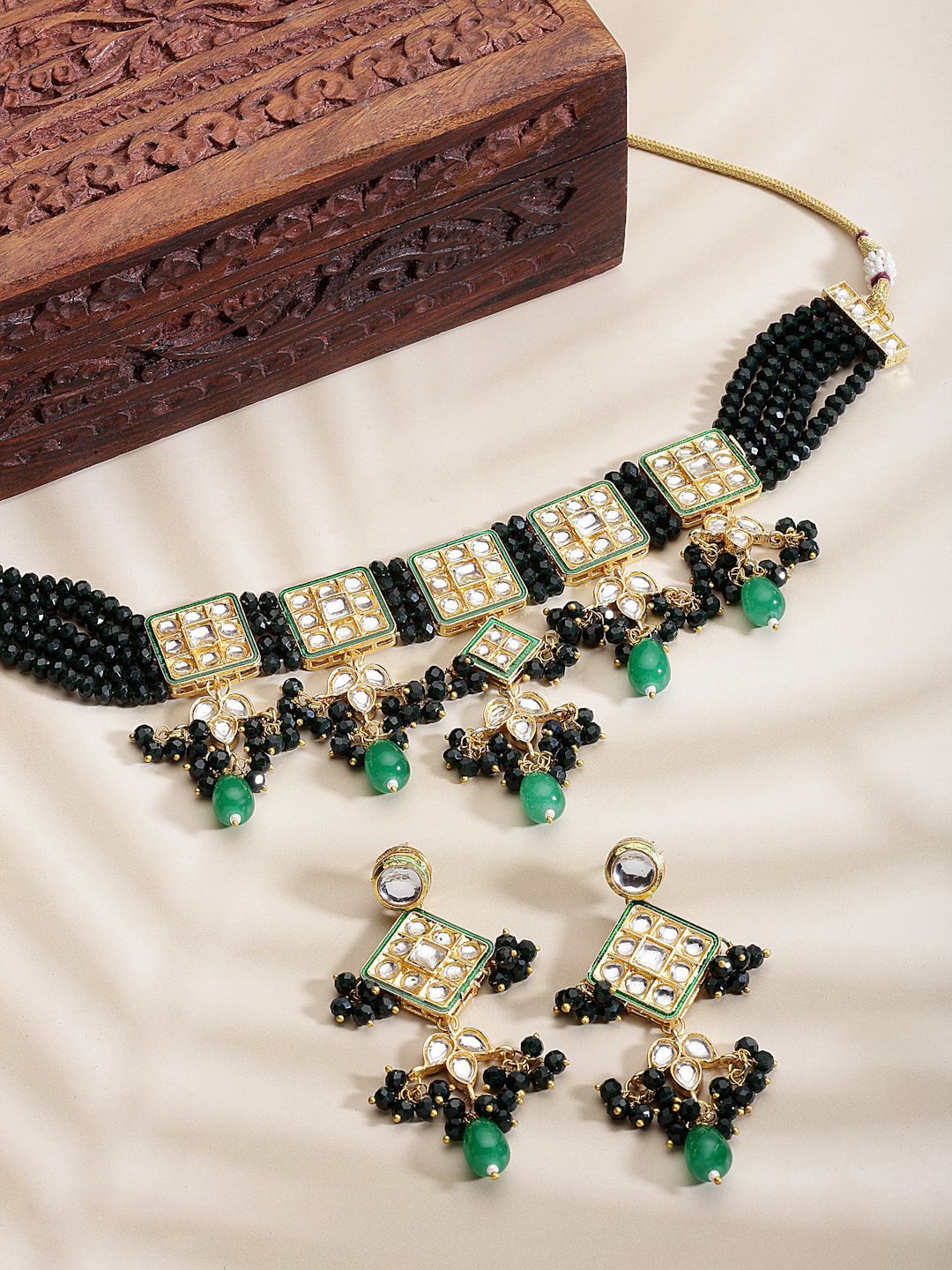 

Anouk Green Gold Plated Kundan Studded & Beaded Jewellery Set