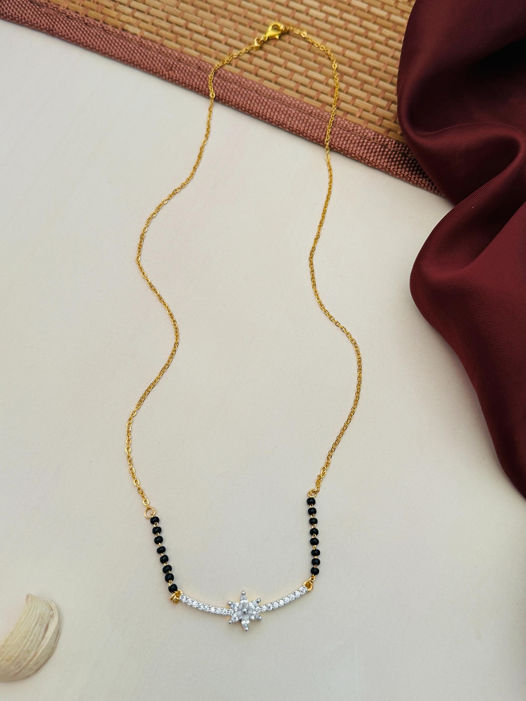 

Anouk Gold-Plated American Diamond Studded & Beaded Mangalsutra