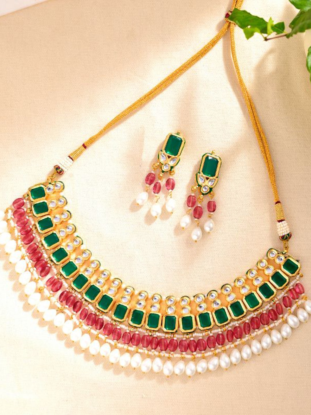 

DASTOOR Gold Plated Stones Studded & Beaded Necklace and Earrings