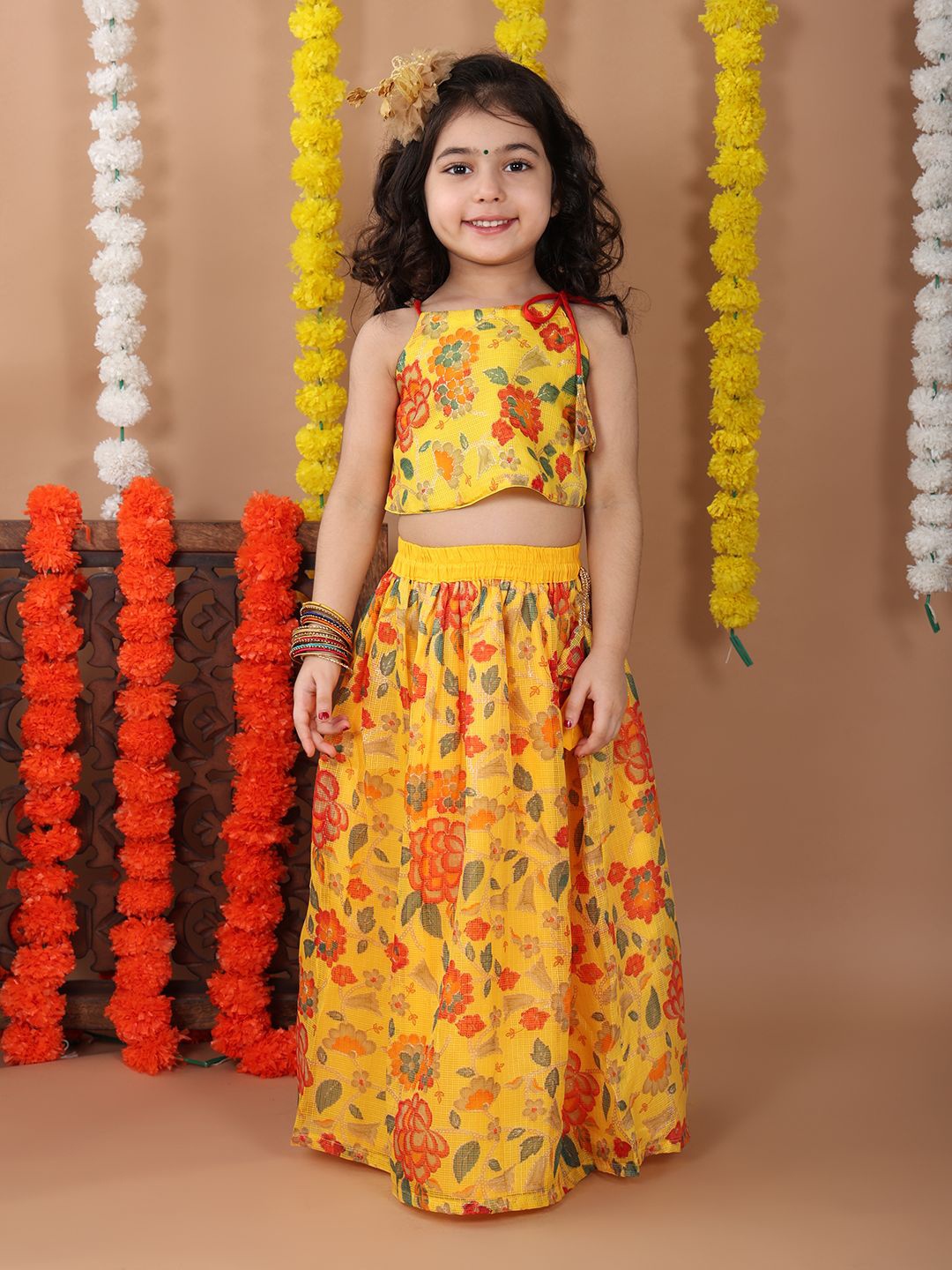

Here&Now X Kinder Kids Girls Printed Ready to Wear Lehenga with sleeveless tie on top, Yellow