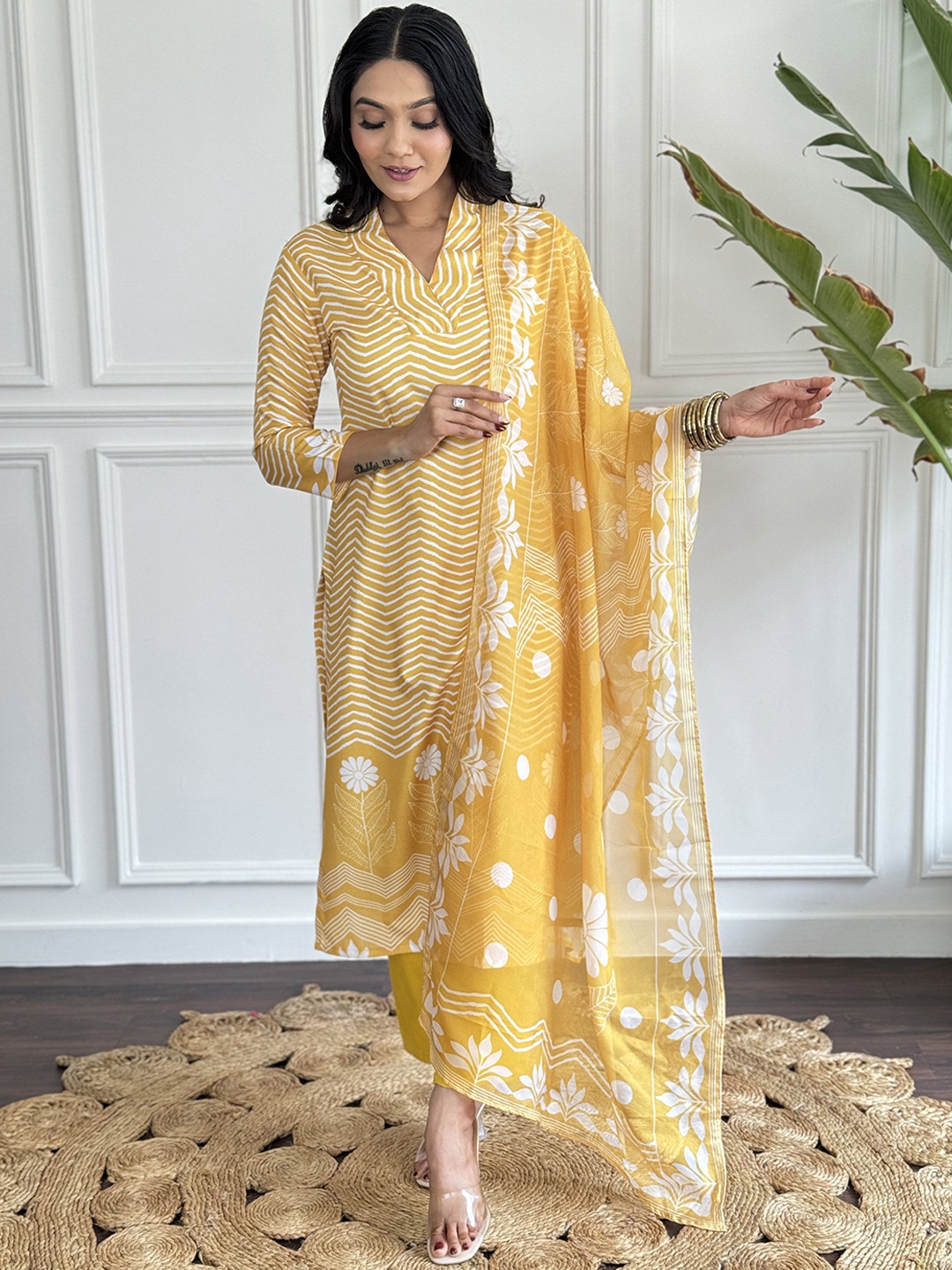 

KALINI Geometric Printed V Neck Straight Kurta with Trousers & Dupatta, Yellow