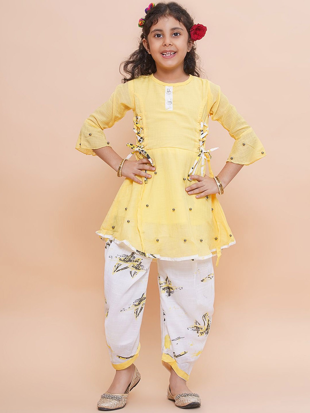 

Arshia Fashions Girls Beads and Stones Embroidered A-Line Kurti with Salwar Pant, Yellow