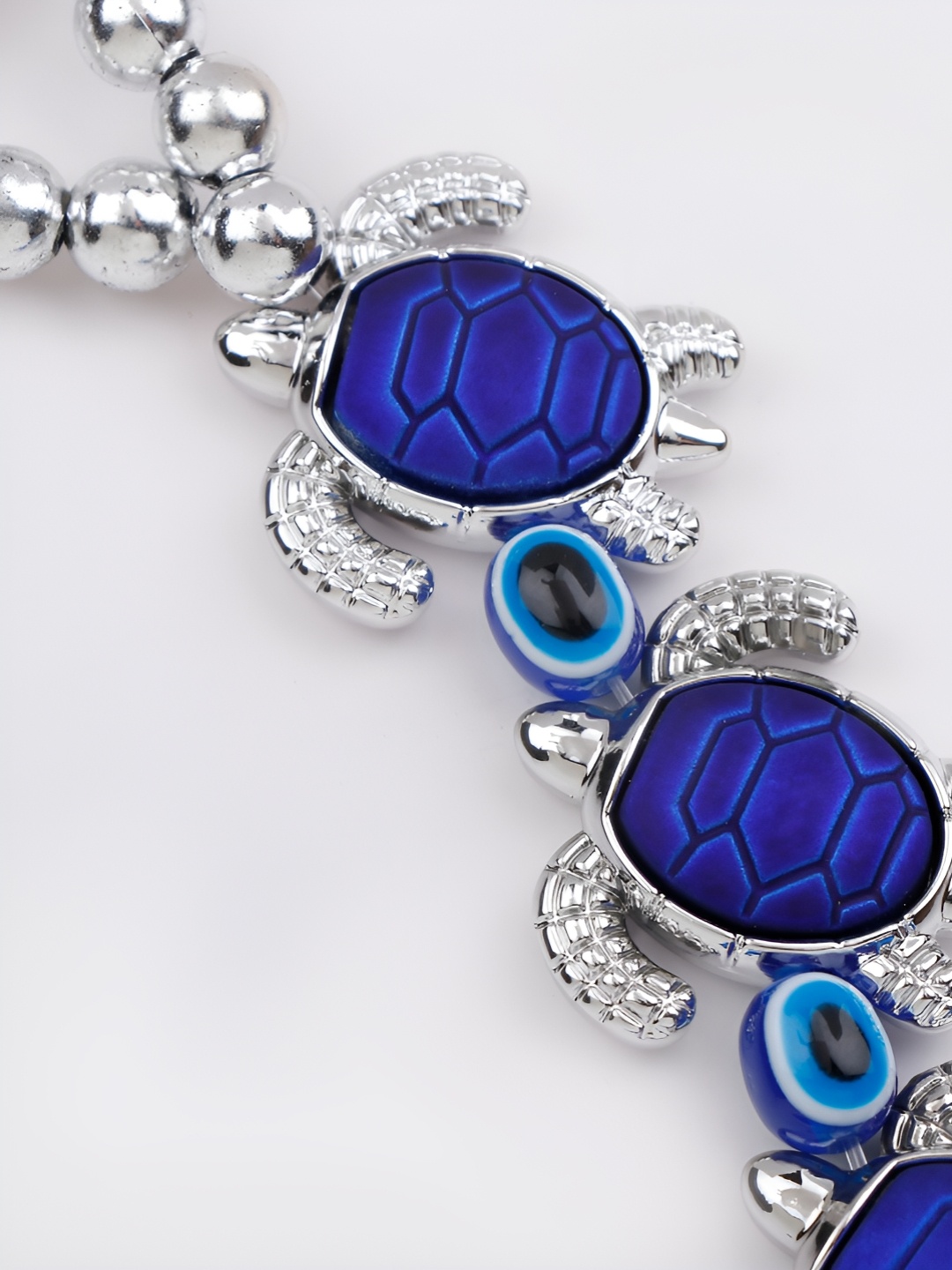 

Archies Blue Glossy Turtle Good Luck Evil Eye Wall Hanging