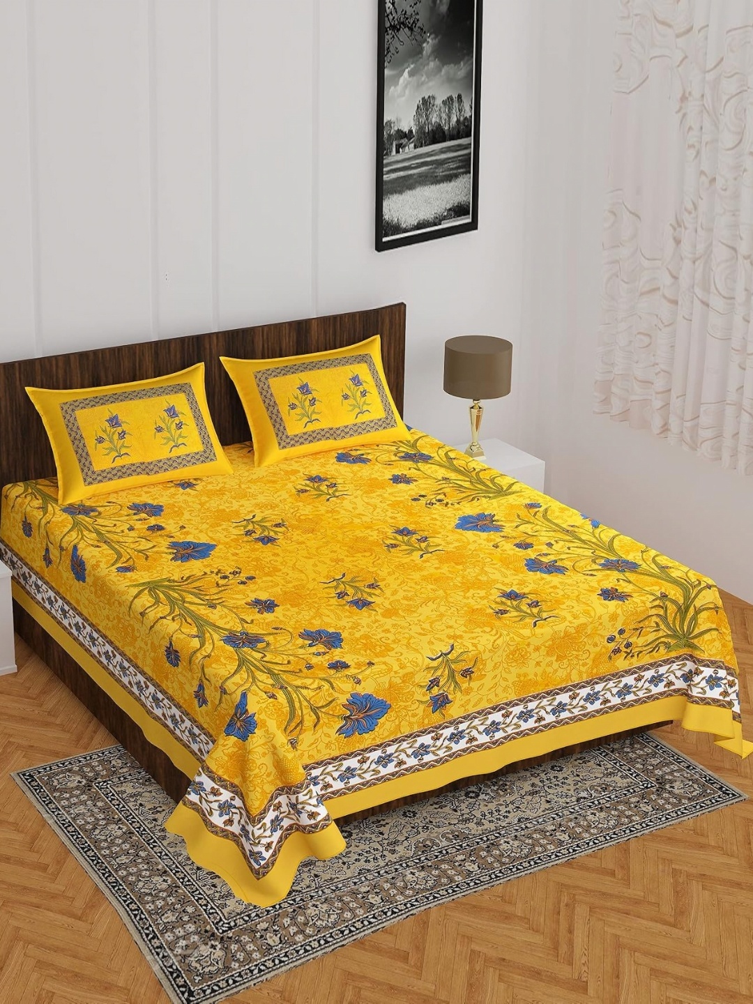 

AYAT COLLECTION Yellow Floral Printed 144 TC Cotton Queen Bedsheet with 2 Pillow Covers