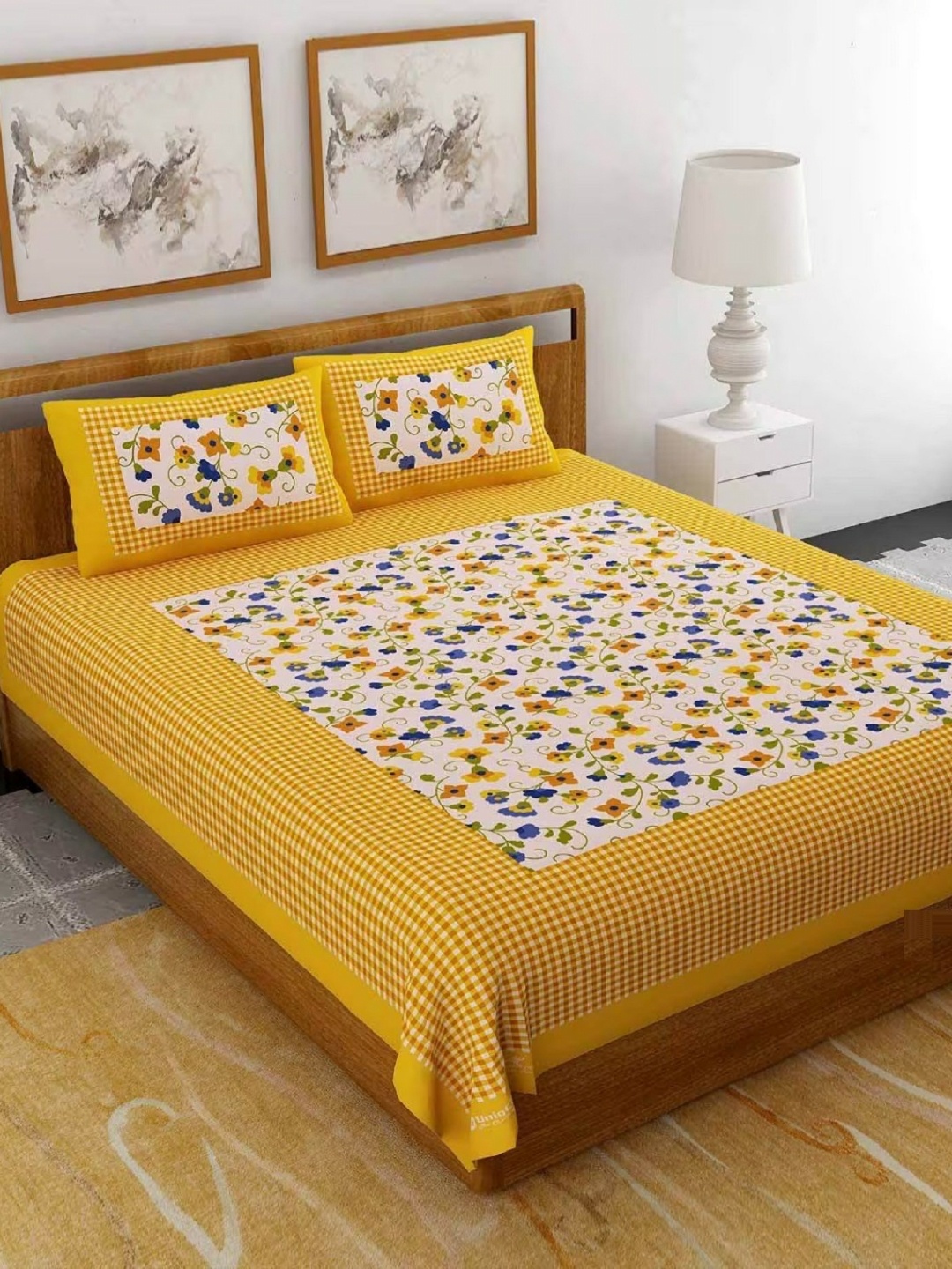 

AYAT COLLECTION Yellow Floral Printed 144 TC Cotton Queen Bedsheet with 2 Pillow Covers