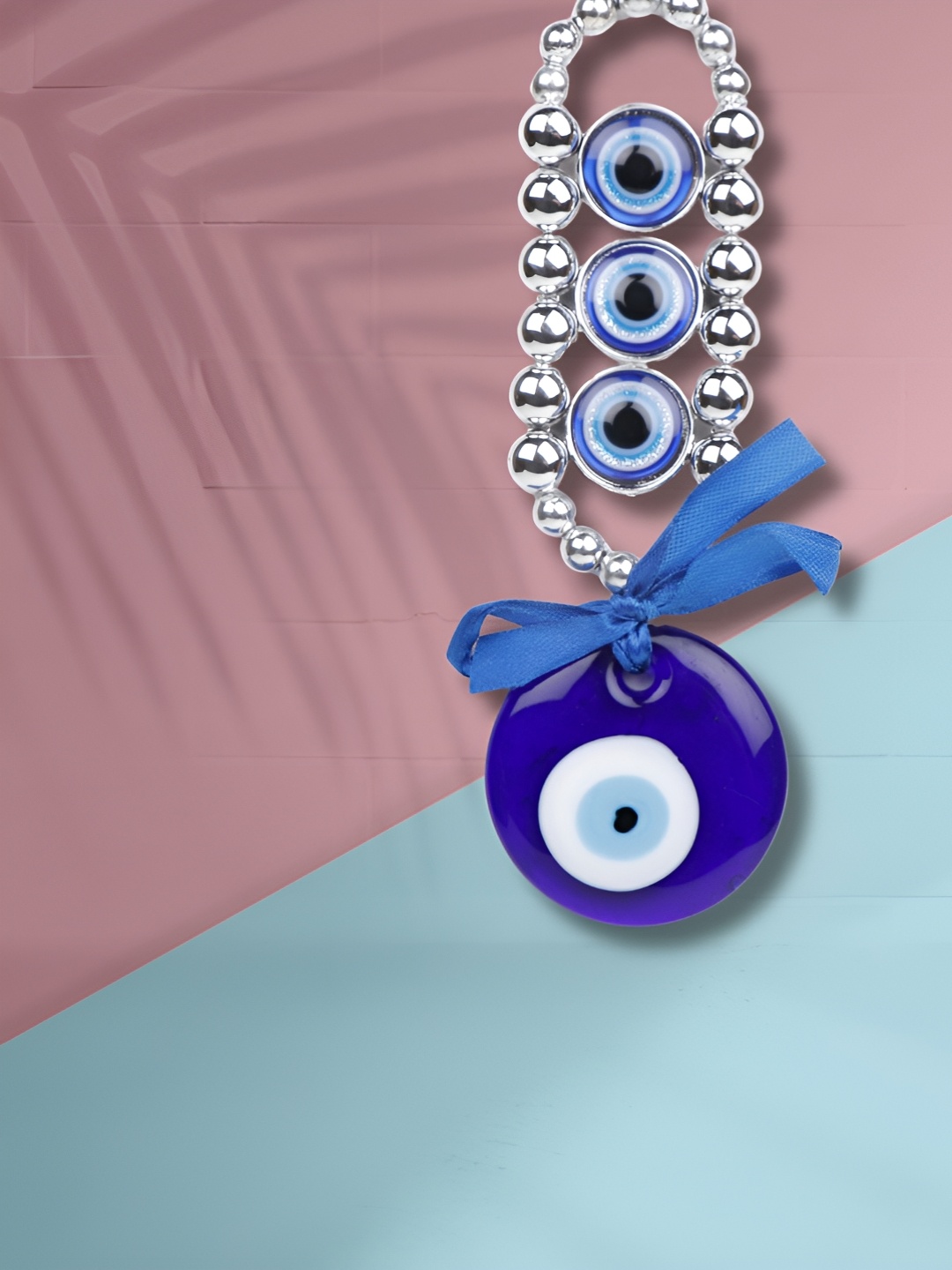 

Archies Blue & Silver Toned Glossy Evil Eye Wall Hanging