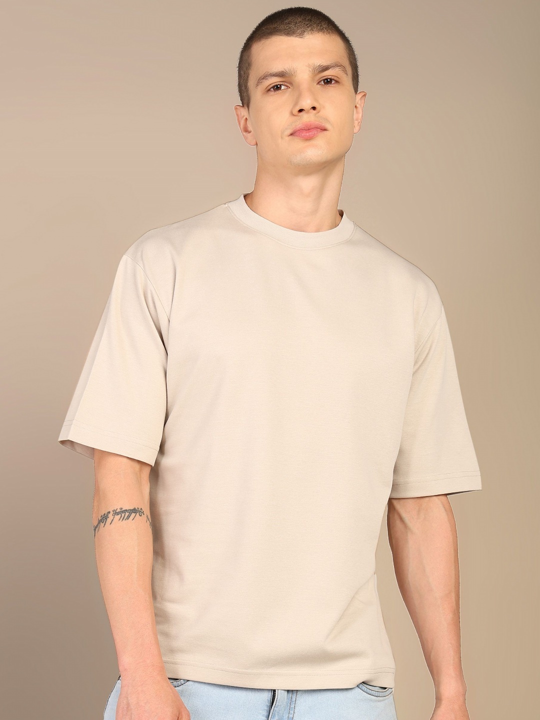 

Alan Jones Men Solid Round Neck Cotton Oversized T-shirt, Beige