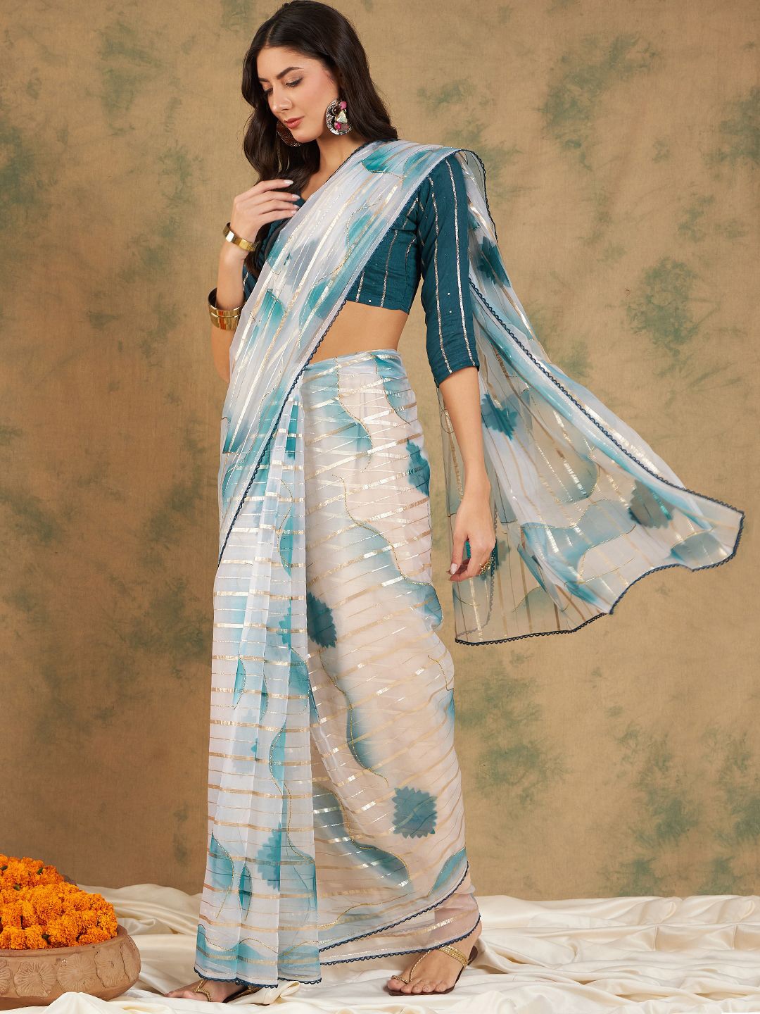 

Maroosh Striped Embellished Zari Organza Fusion Saree, Blue