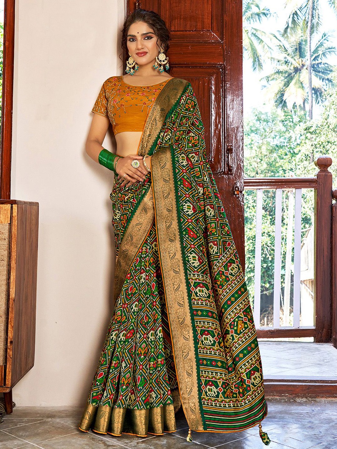 

Mitera Ethnic Motifs Woven Design Zari Patola Saree, Green