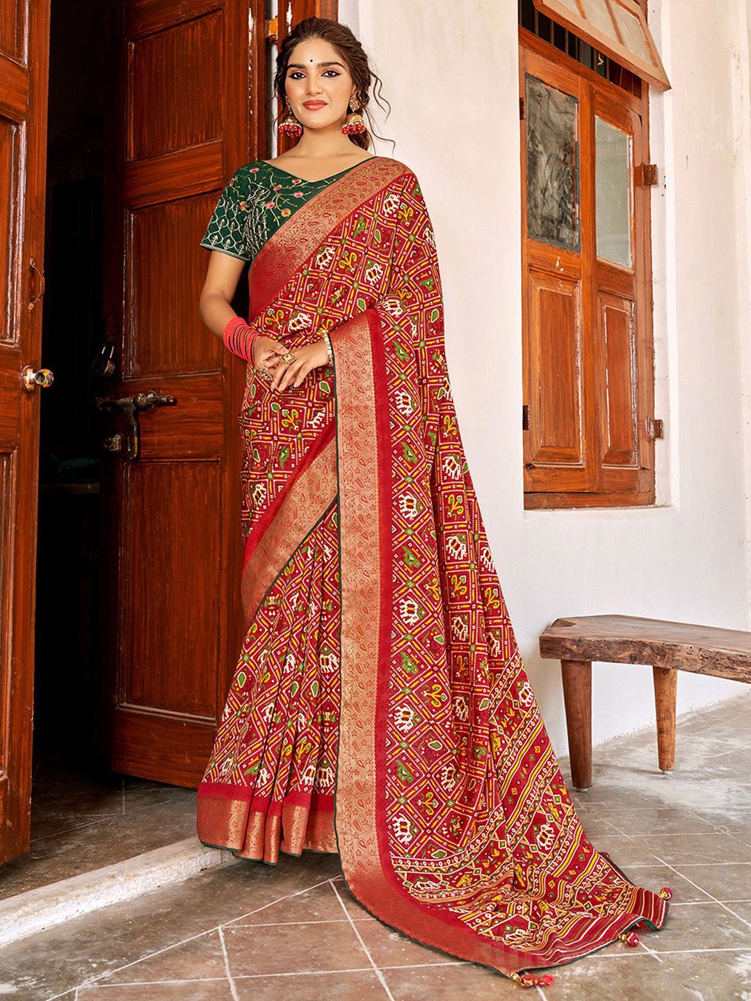 

Mitera Ethnic Motifs Zari Silk Blend Patola Saree, Red