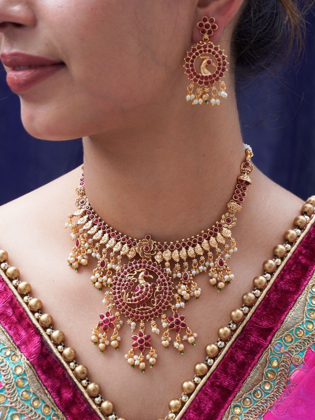 

Niscka Gold Plated Stone Studded & Pearls Beaded Jewellery set