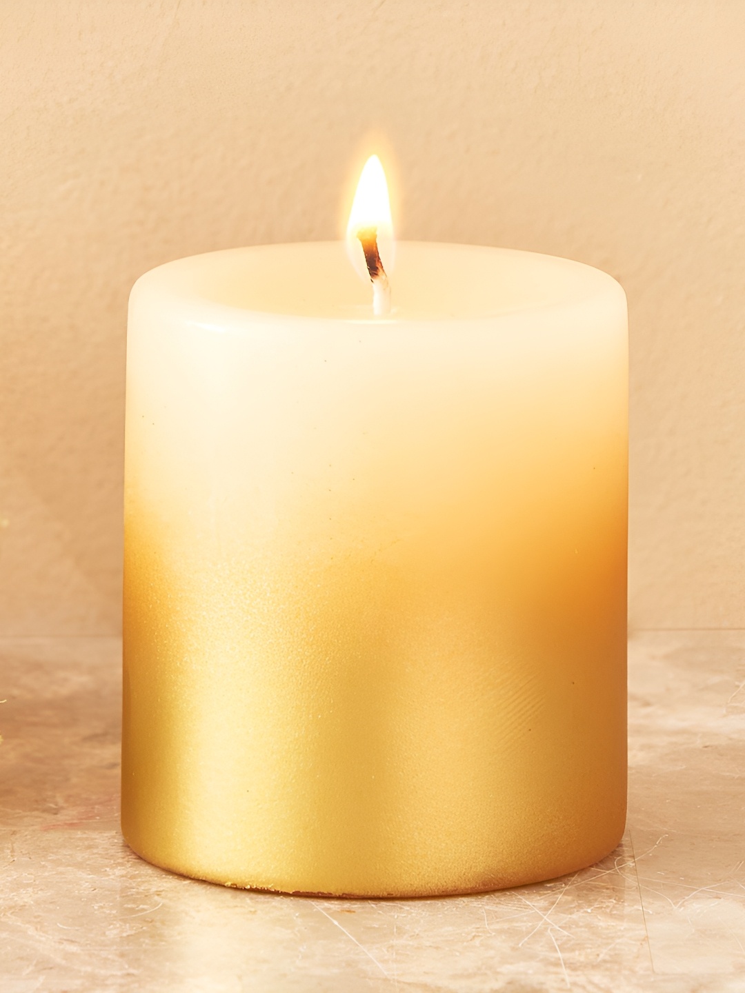 

Home Centre Beige Scented Pillar Candle