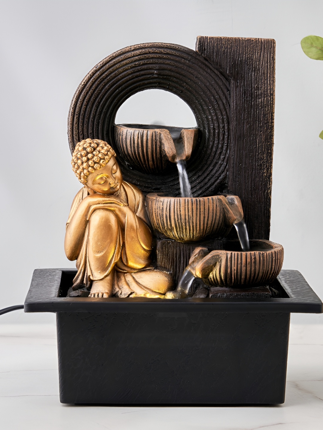 

Home Centre Corsica Alpine Gold-Toned & Black Resting Buddha Fountain
