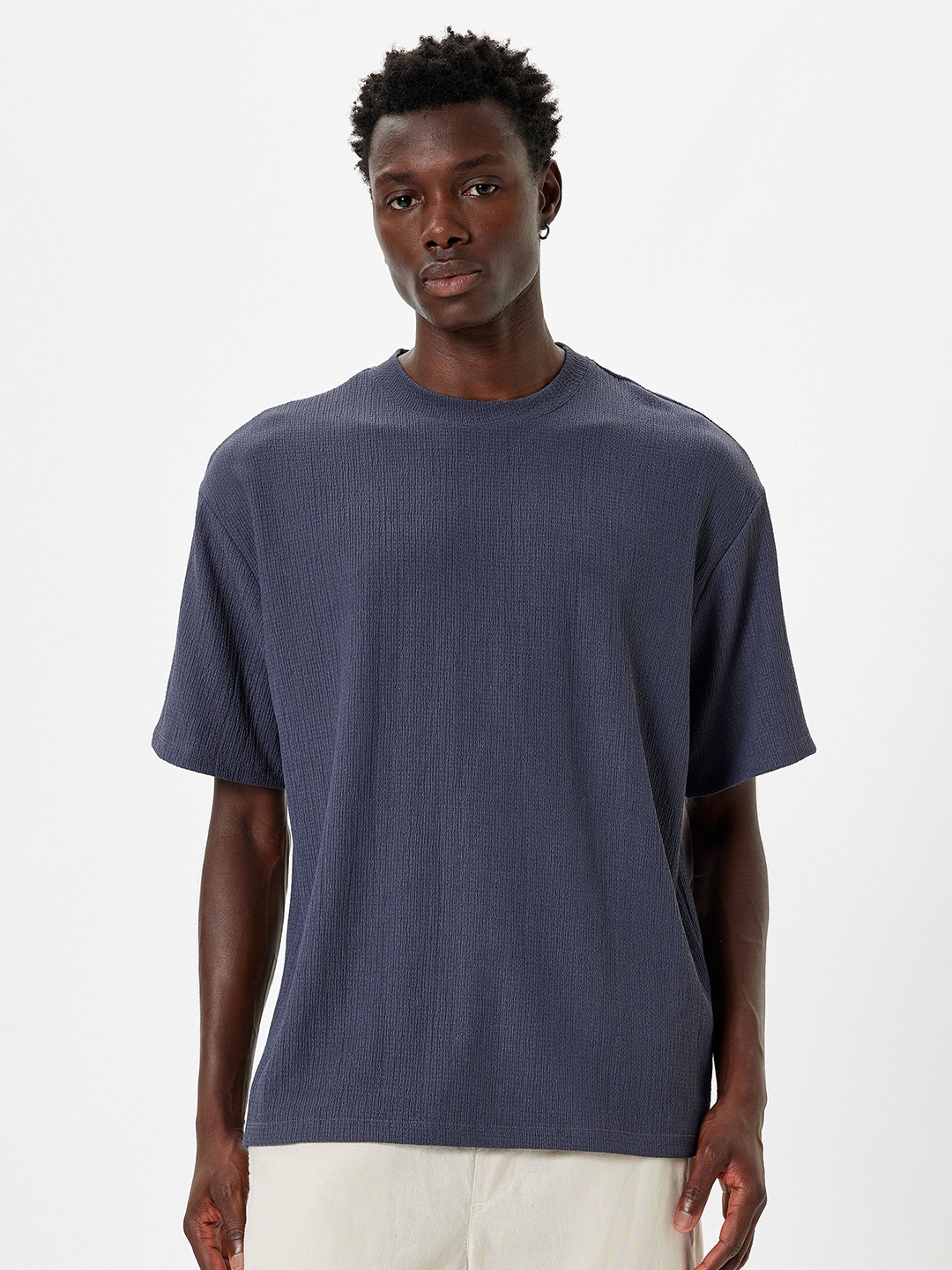 

Koton Men Solid Round Neck Oversized T-shirt, Blue