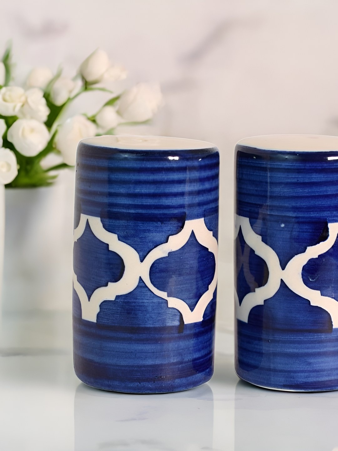 

The Decor Lane Blue & White Ceramic Salt and Pepper Shakers